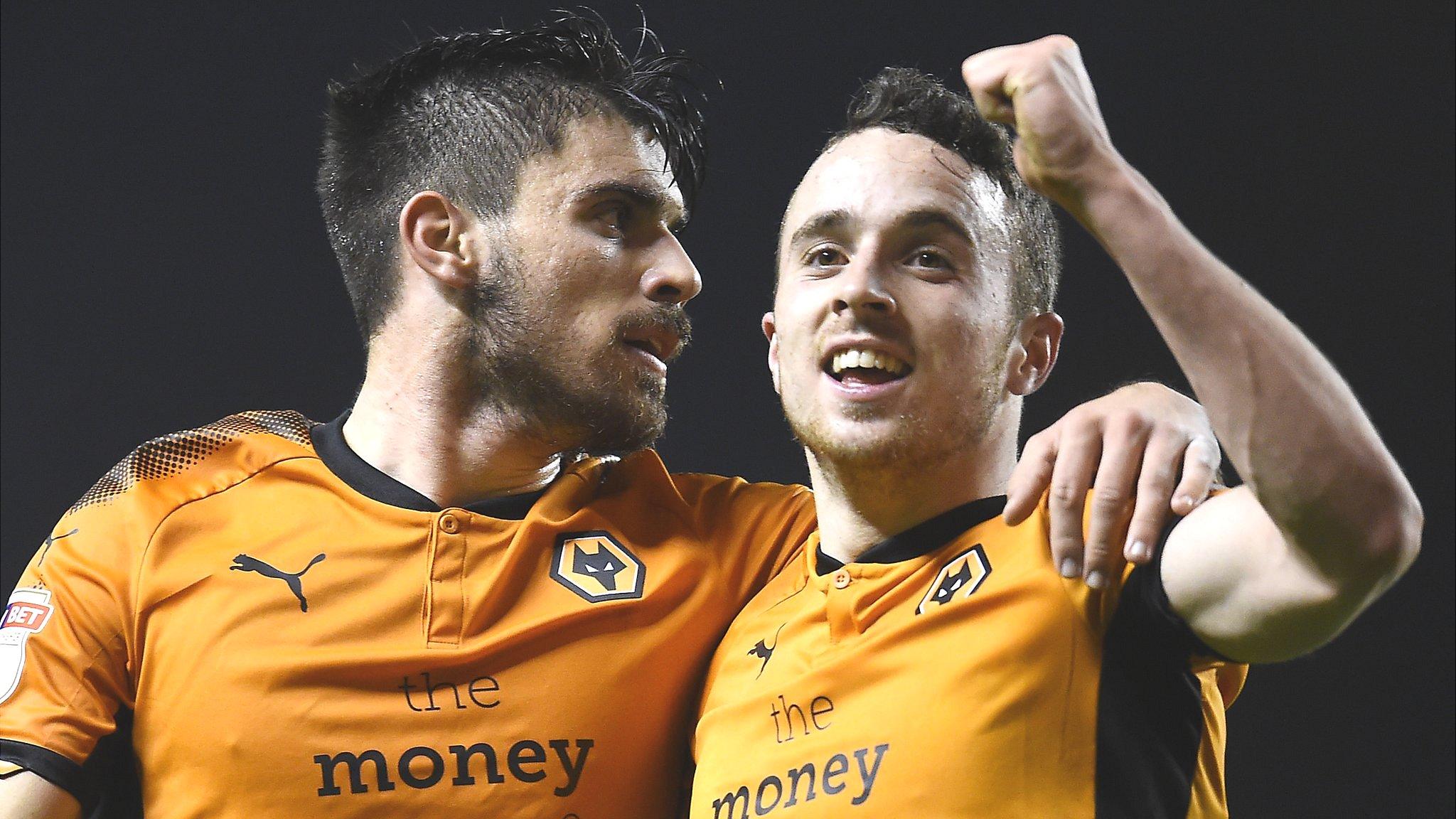 Diogo Jota celebrates after scoring Wolves' third goal against Brentford