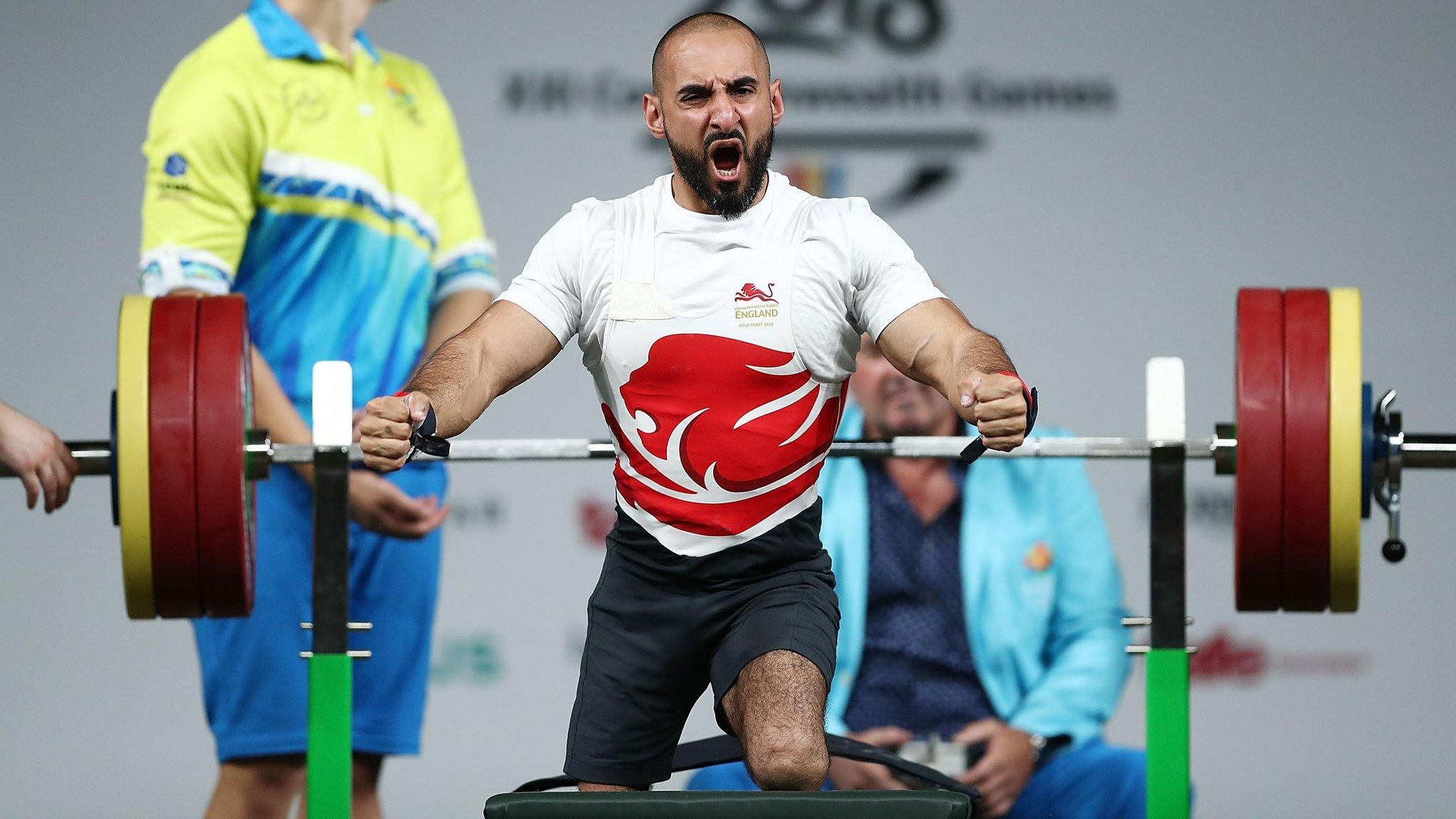 Ali Jawad of England celebrates a lift in the men's lightweight final during the Para Powerlifting on day six of the Gold Coast 2018 Commonwealth Games at Carrara Sports and Leisure Centre