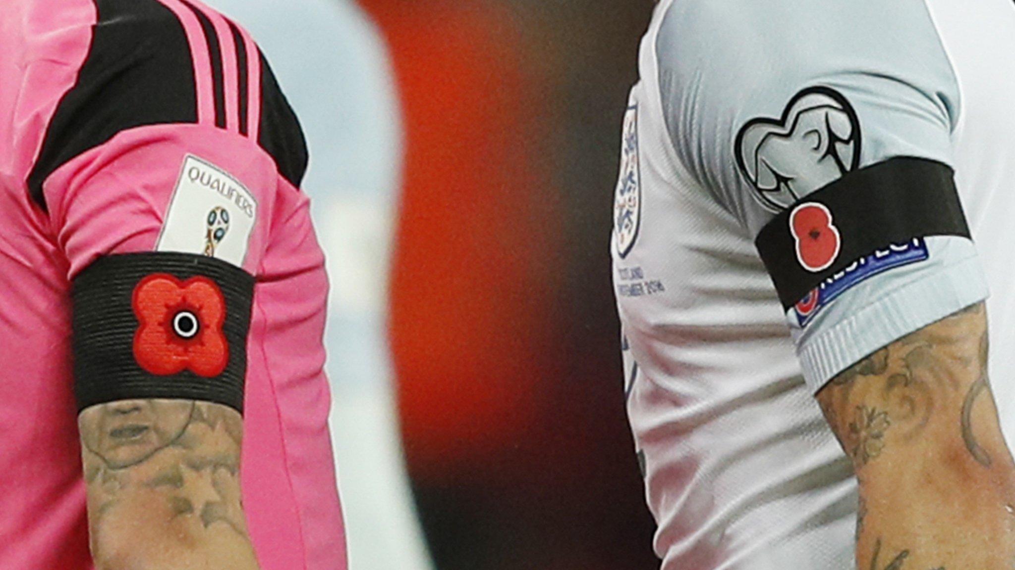 Poppy armbands at England v Scotland match