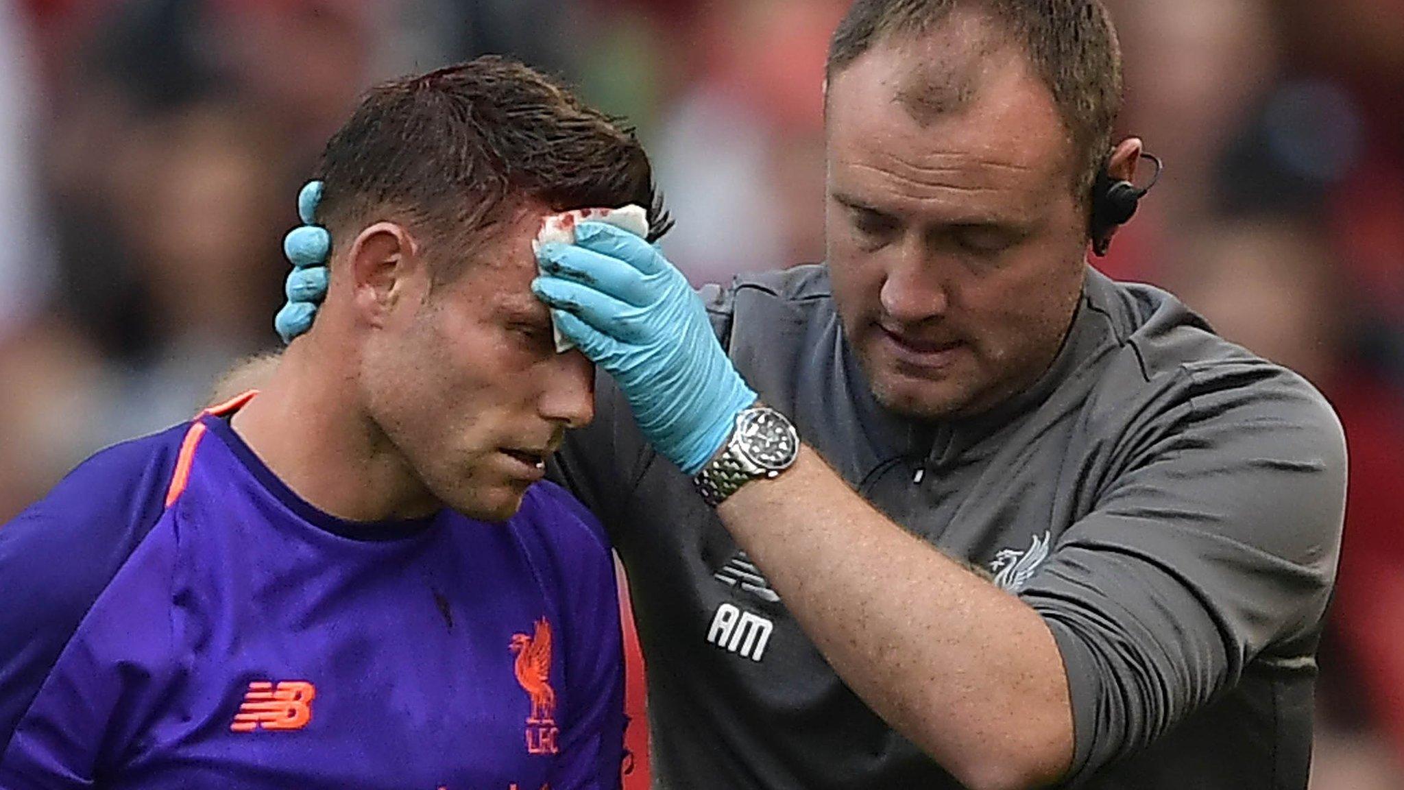 Liverpool's James Milner suffers head injury