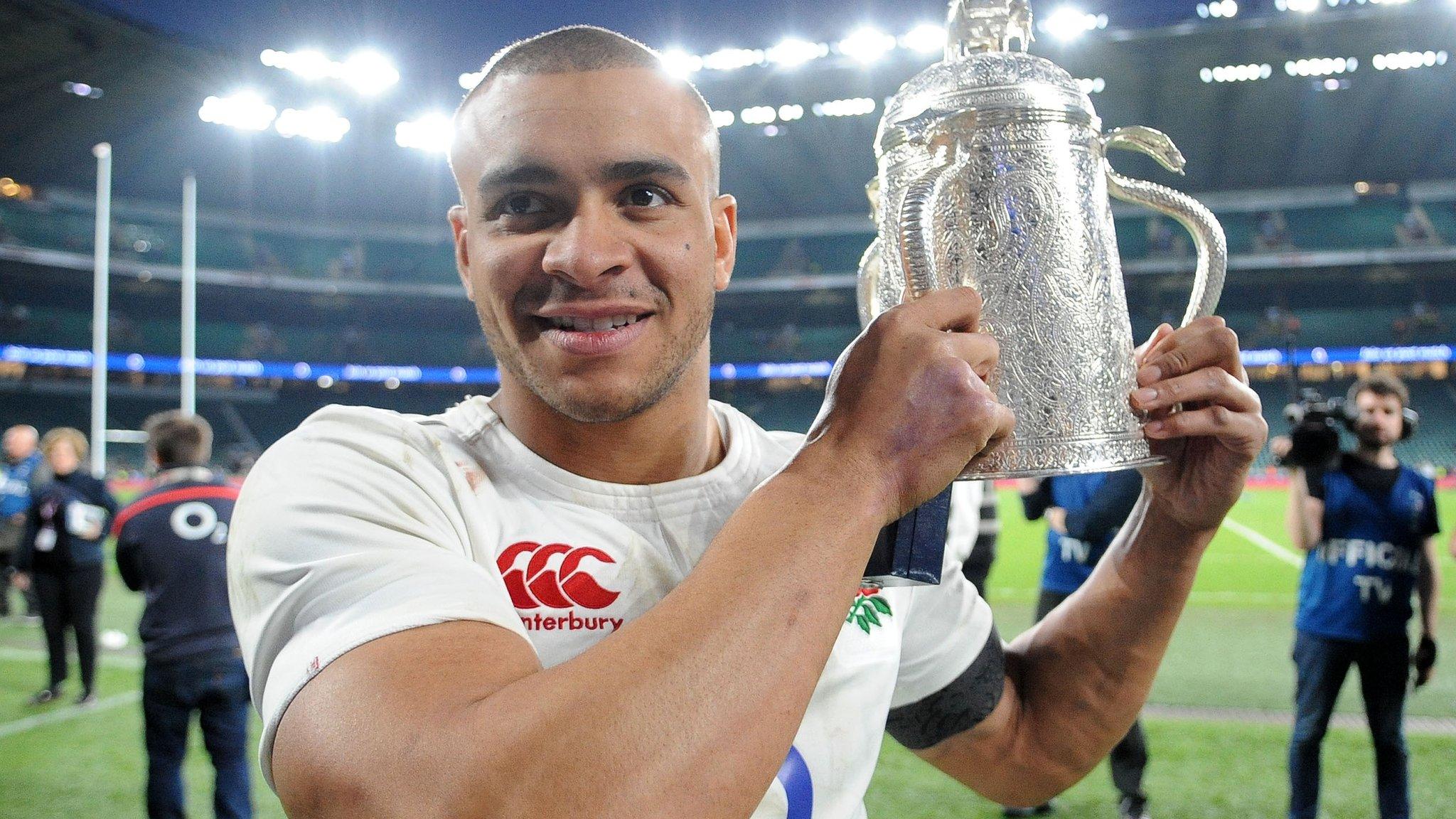 Jonathan Joseph holds aloft the Calcutta Cup