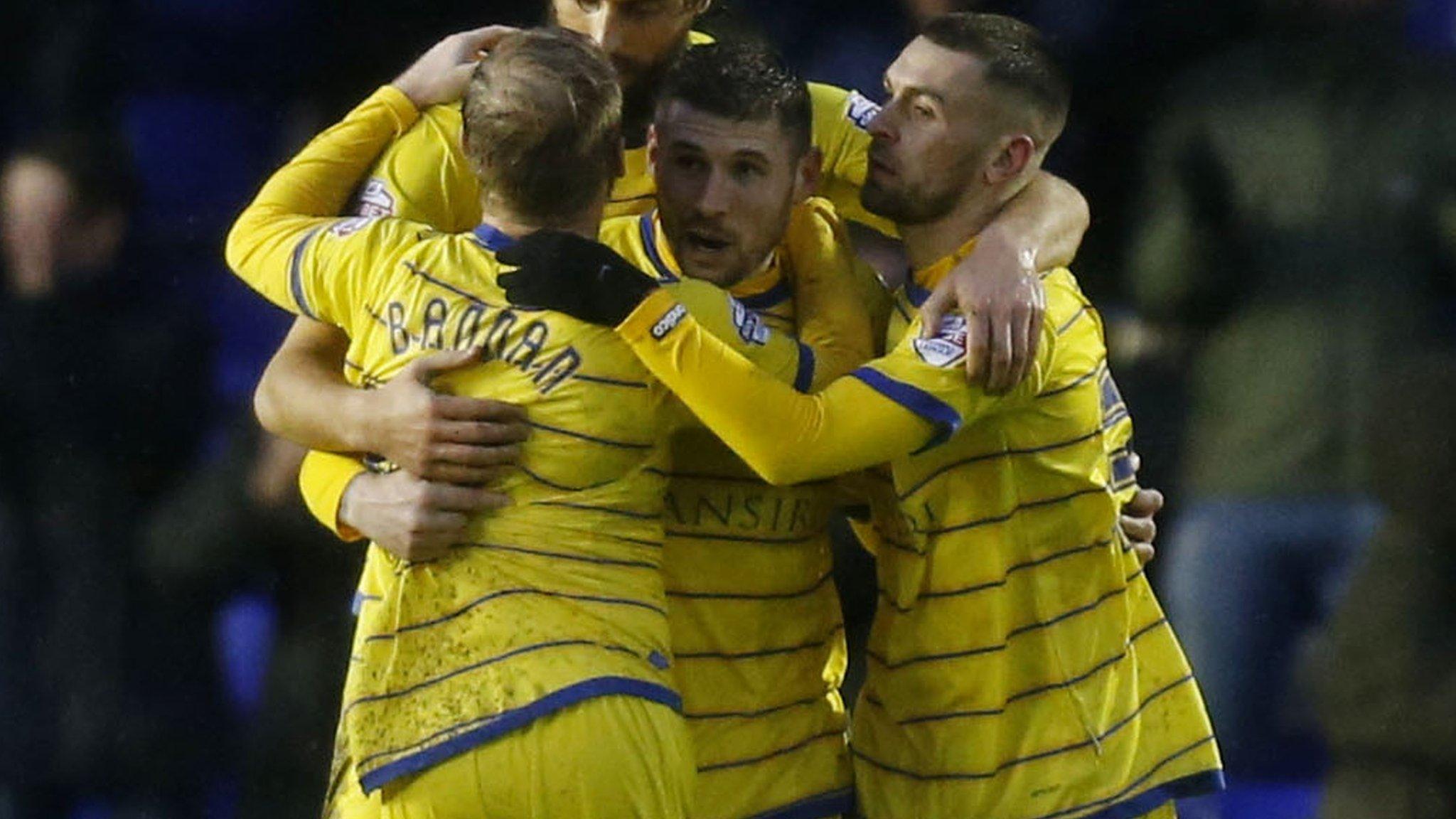 Gary Hooper celebrates with his teammates