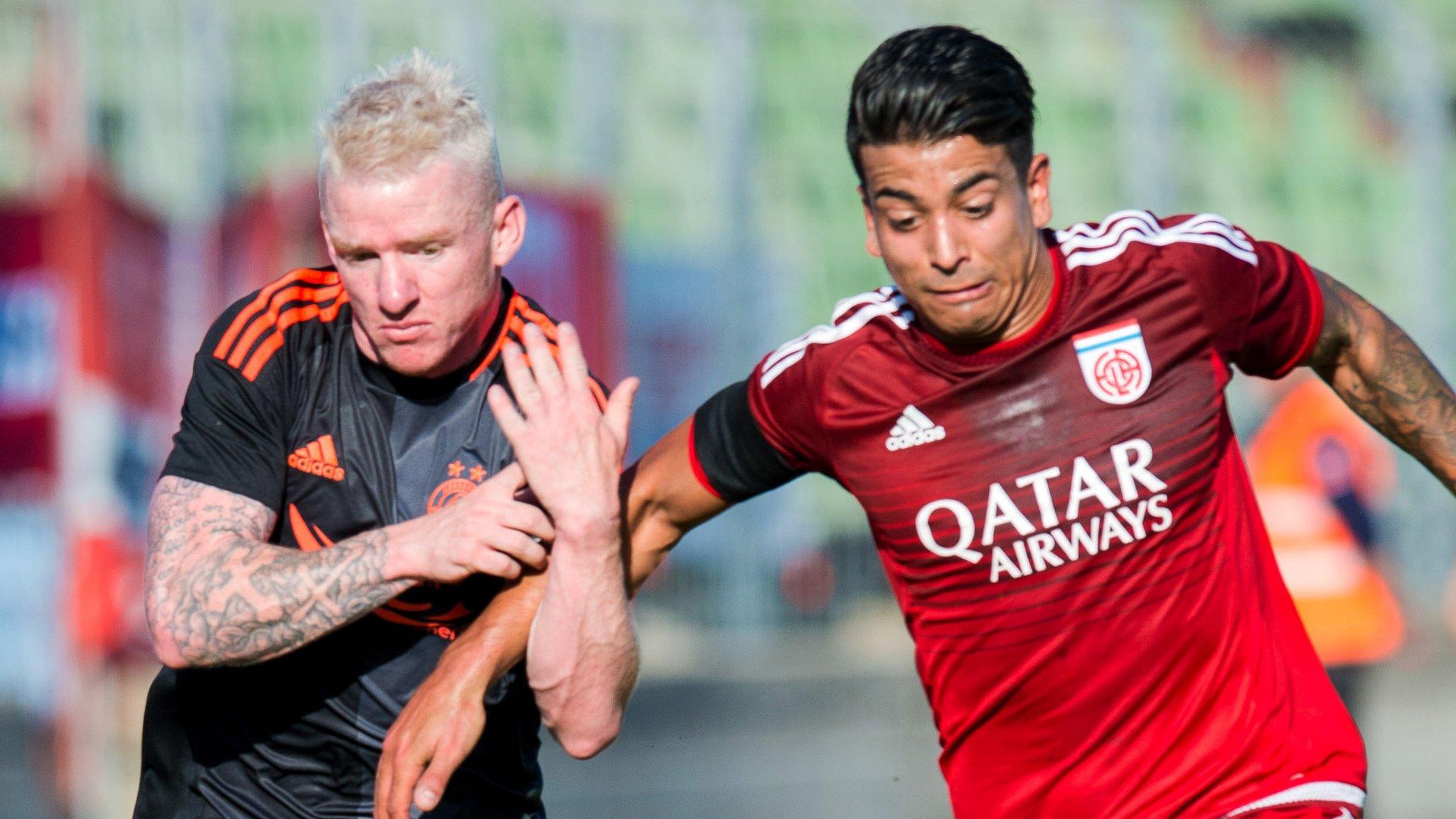 Aberdeen's Jonny Hayes (left) and Fola Esch's Kirch Mehdi