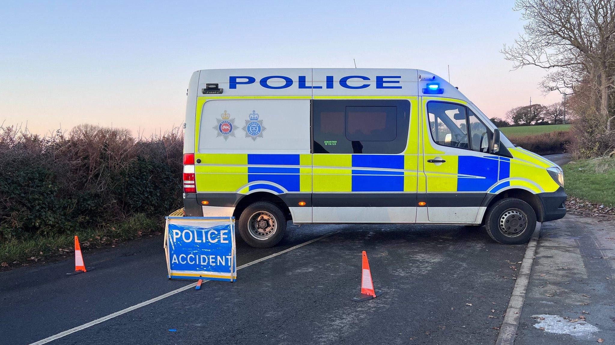 Police at the scene on the B2095 in Hooe