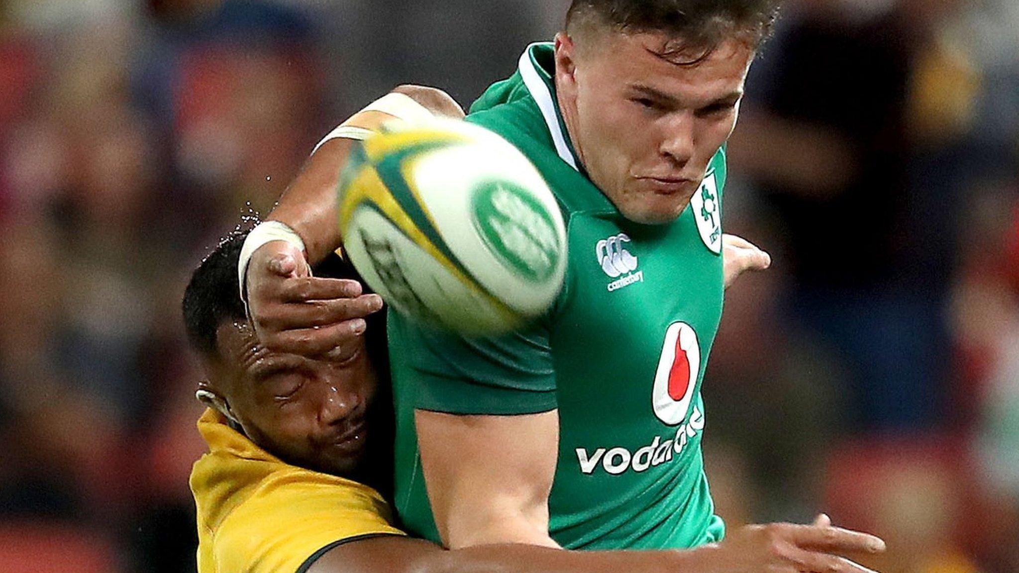 Ireland's Jacob Stockdale tackled by Samu Kerevi of Australia