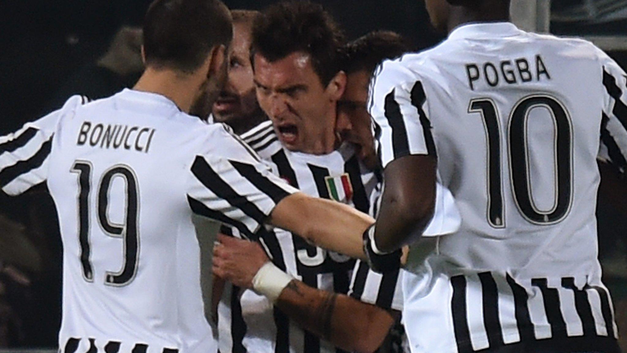 Mario Mandzukic celebrates his opening goal for Juventus at Palermo