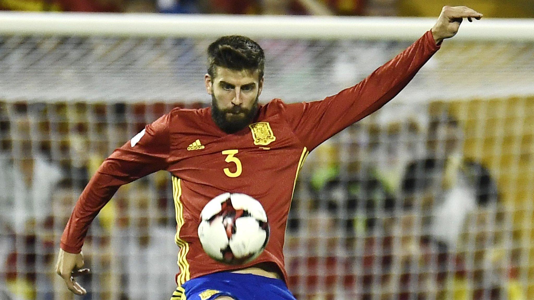 Barcelona defender Gerard Pique playing for Spain