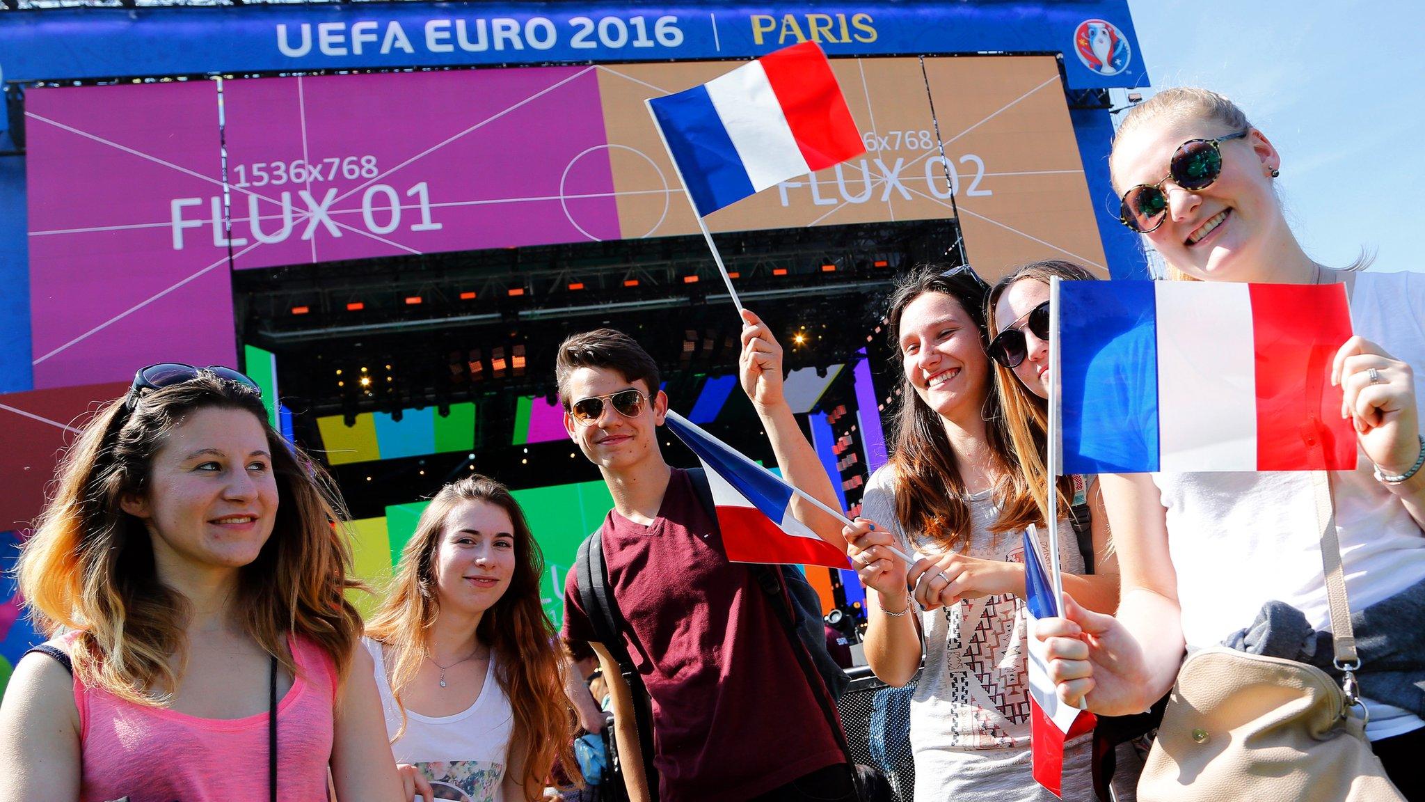 French fans gather at the Euro 2016 fan zone at Champ de Mars near the Eiffel Tower in Paris