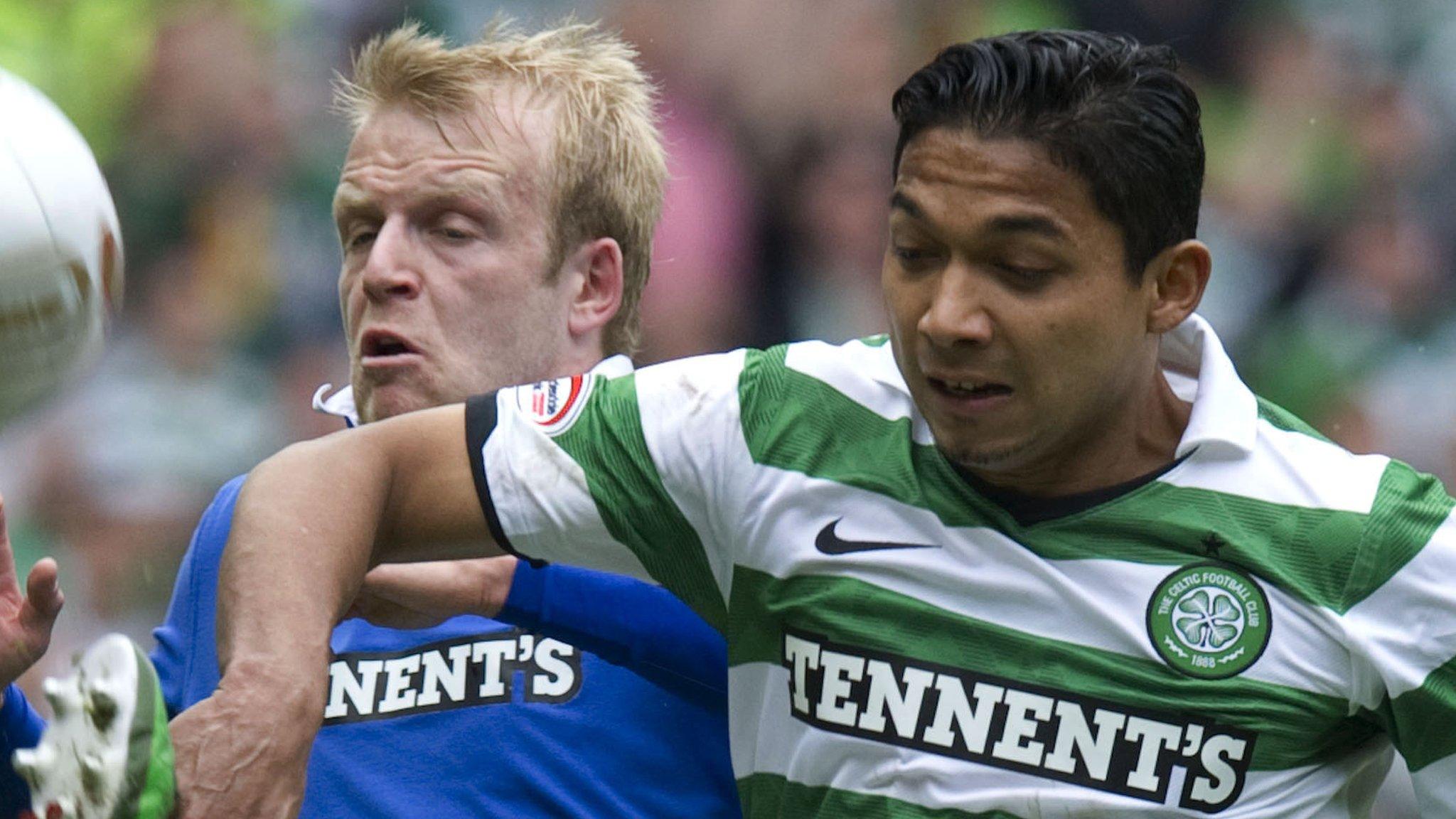 Steven Naismith challenges Celtic's Emilio Izaguirre while with Rangers