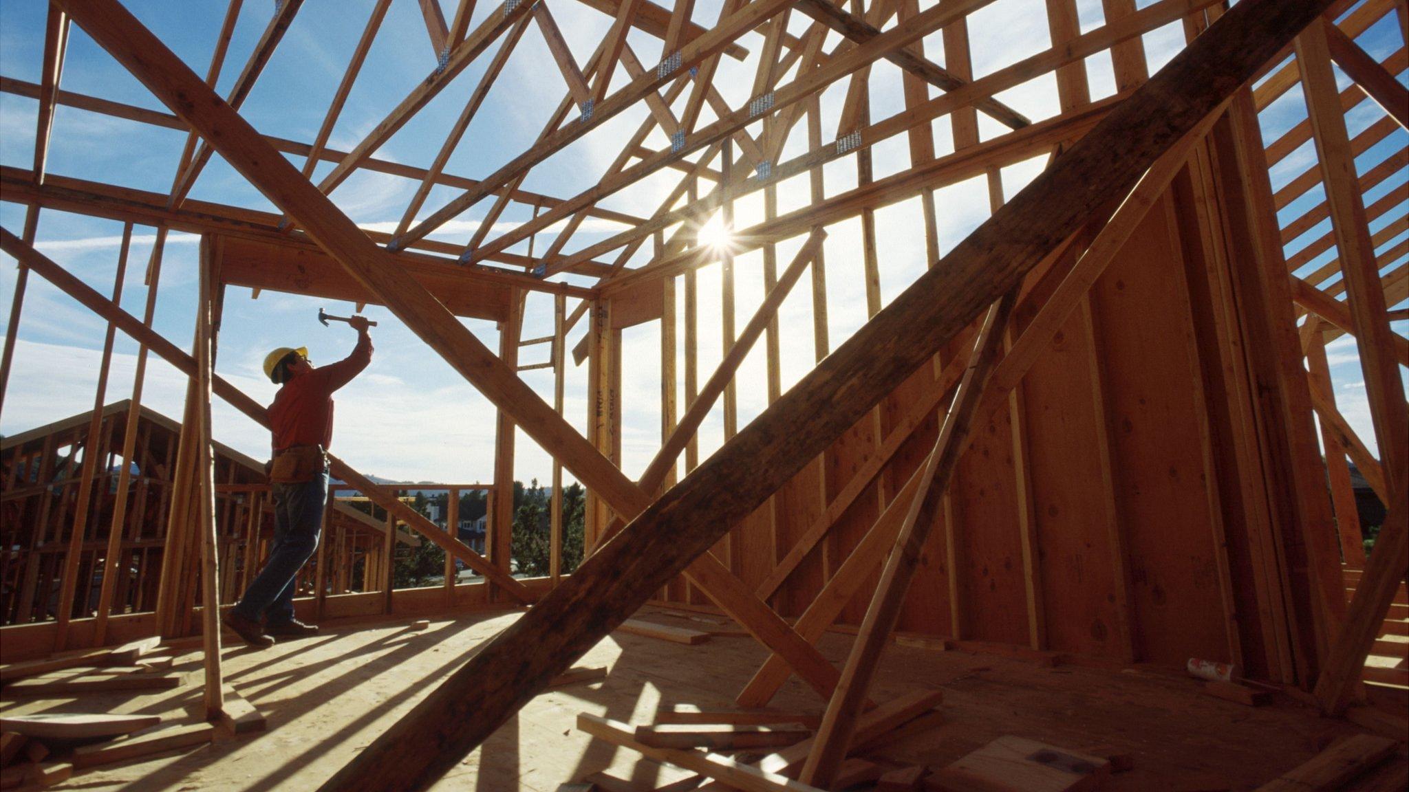 Carpenter working on a house