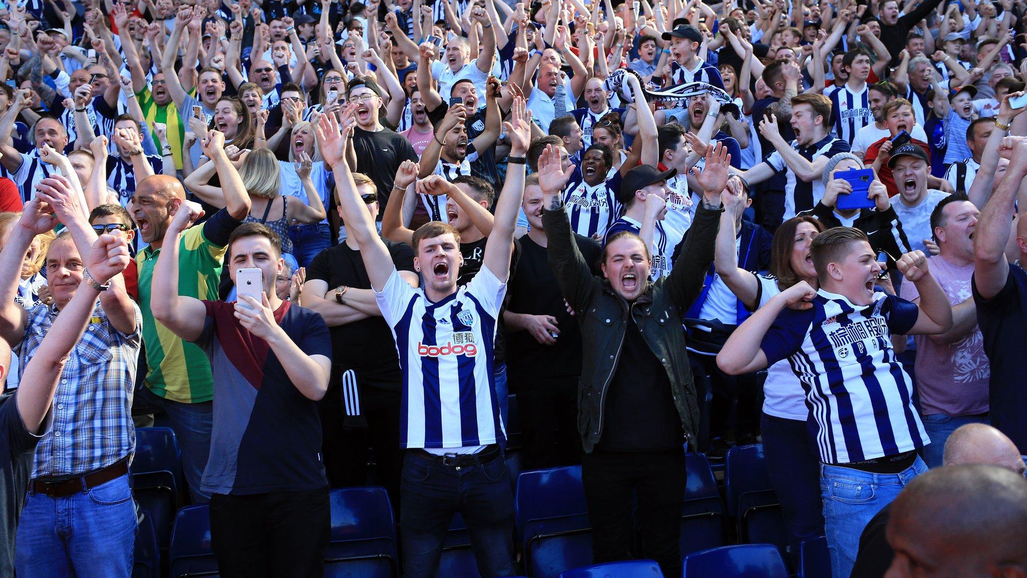 West Bromwich Albion fans celebrate a goal at the Hawthorns