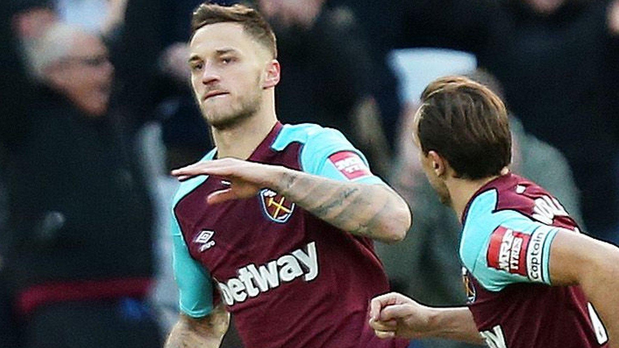 Marko Arnautovic celebrates after scoring for West Ham against Chelsea