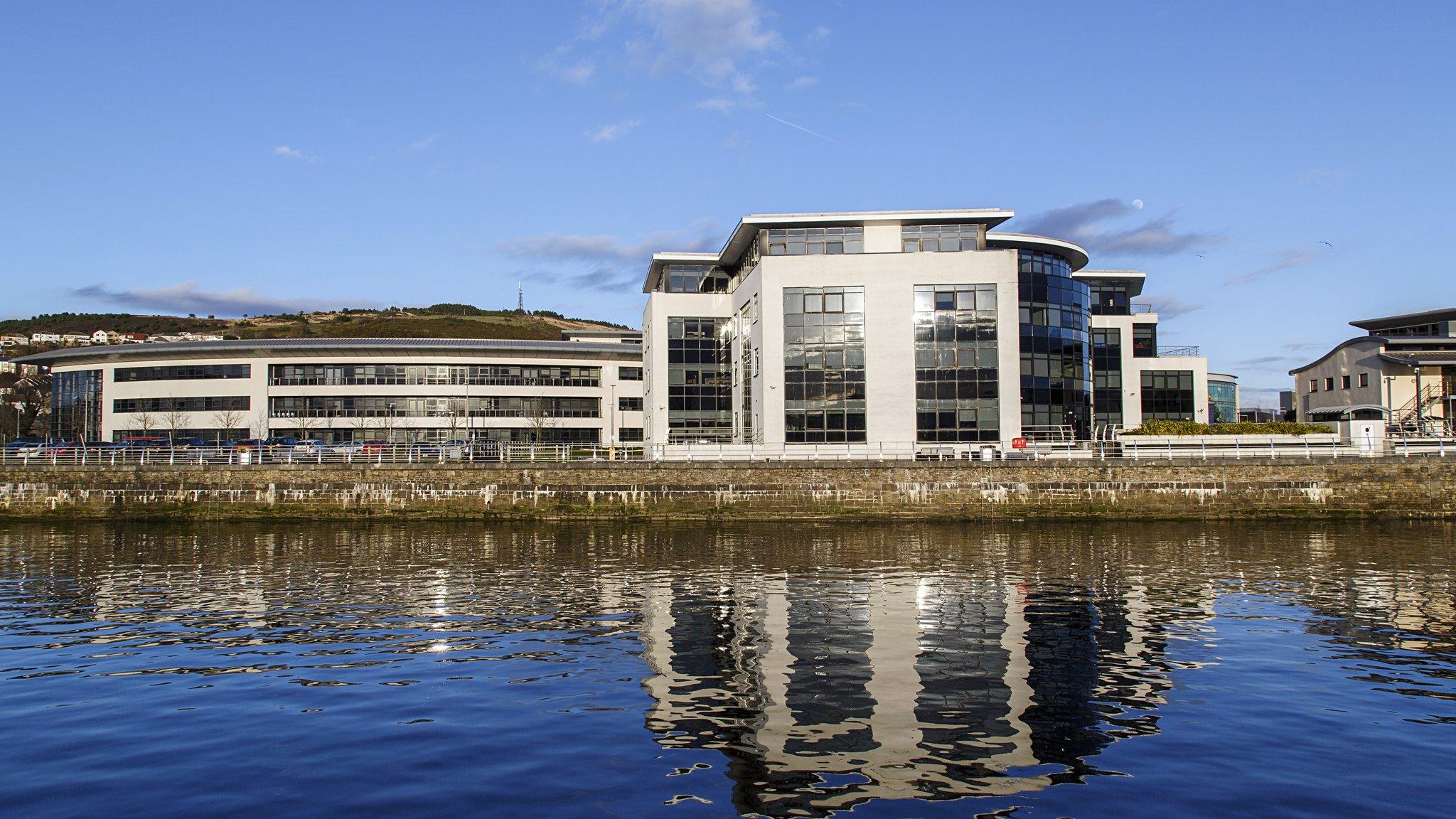 Office in the SA1 waterfront area of Swansea, with water in foreground