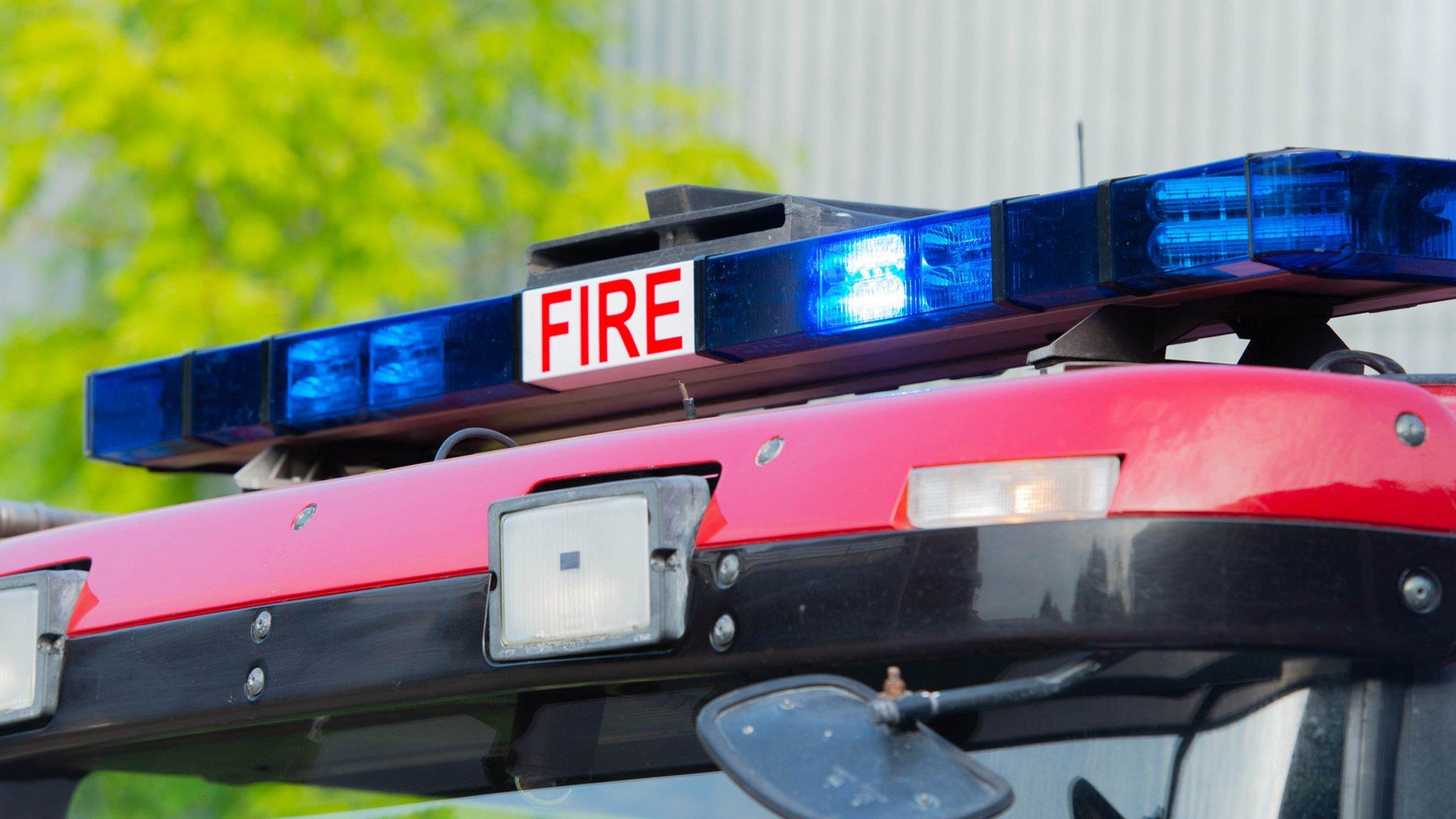 A close up of the lights on top of a fire engine.