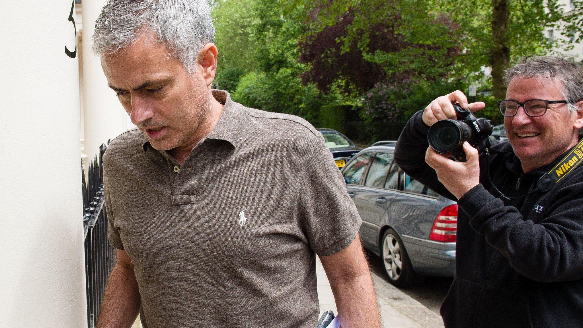 Mourinho was surrounded by media outside his London home