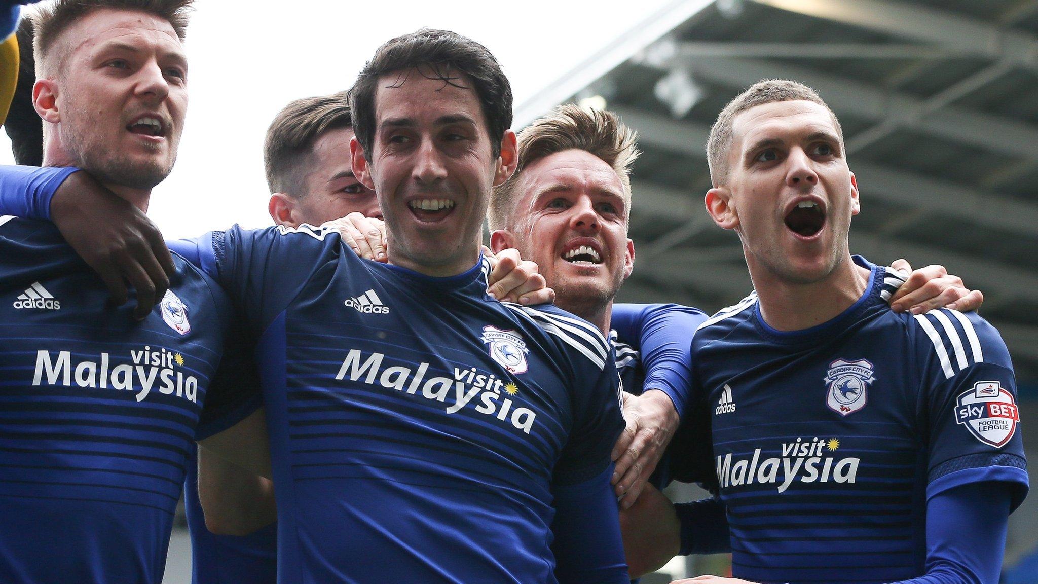 Peter Whittingham celebrates with team-mates after his stoppage time penalty