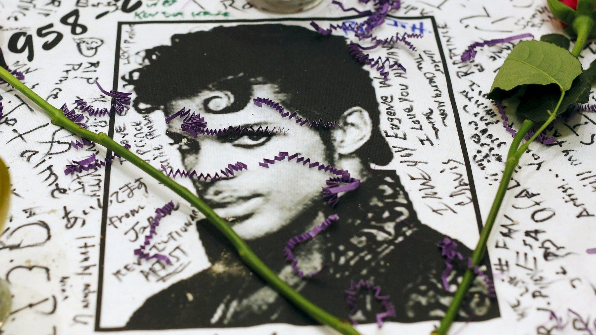 A makeshift memorial is seen as fans gather at Harlem"s Apollo Theater to celebrate the life of deceased musician Prince in the Manhattan borough of New York, U.S., April 21, 2016