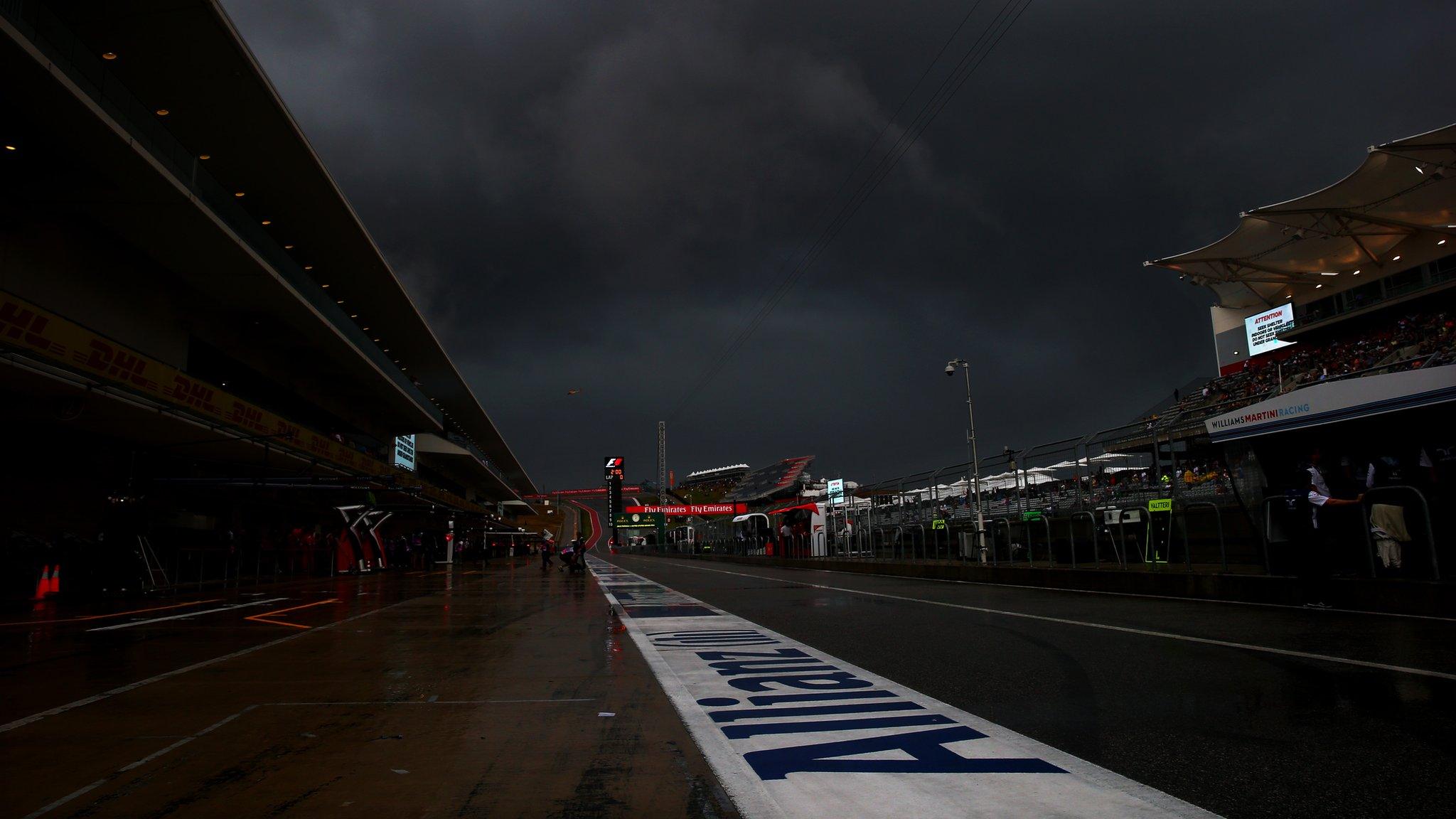 Rain falls in the paddock