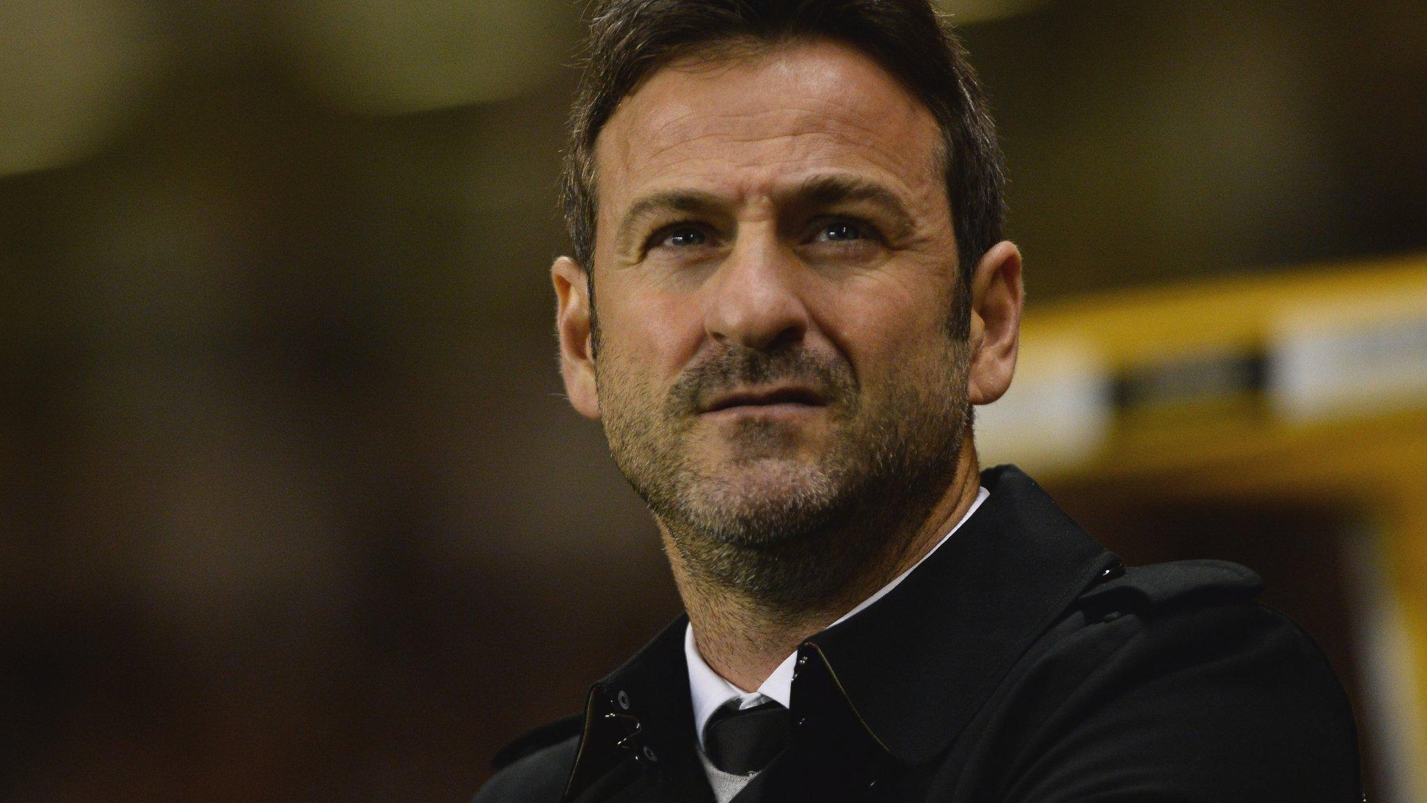 Thomas Christiansen looks on from the sidelines