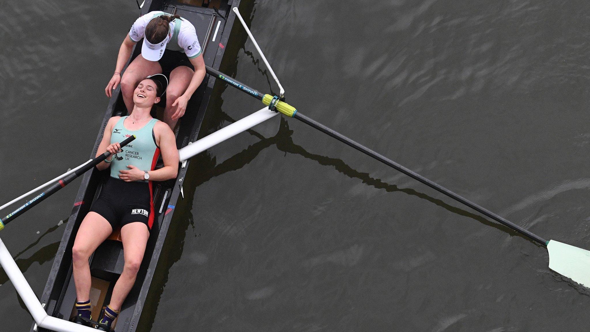 Members of the Cambridge University womens crew celebrate after winning the women's boat race on the River Thames against Oxford University at Mortlake, South West London, Britain, 24 March 2018