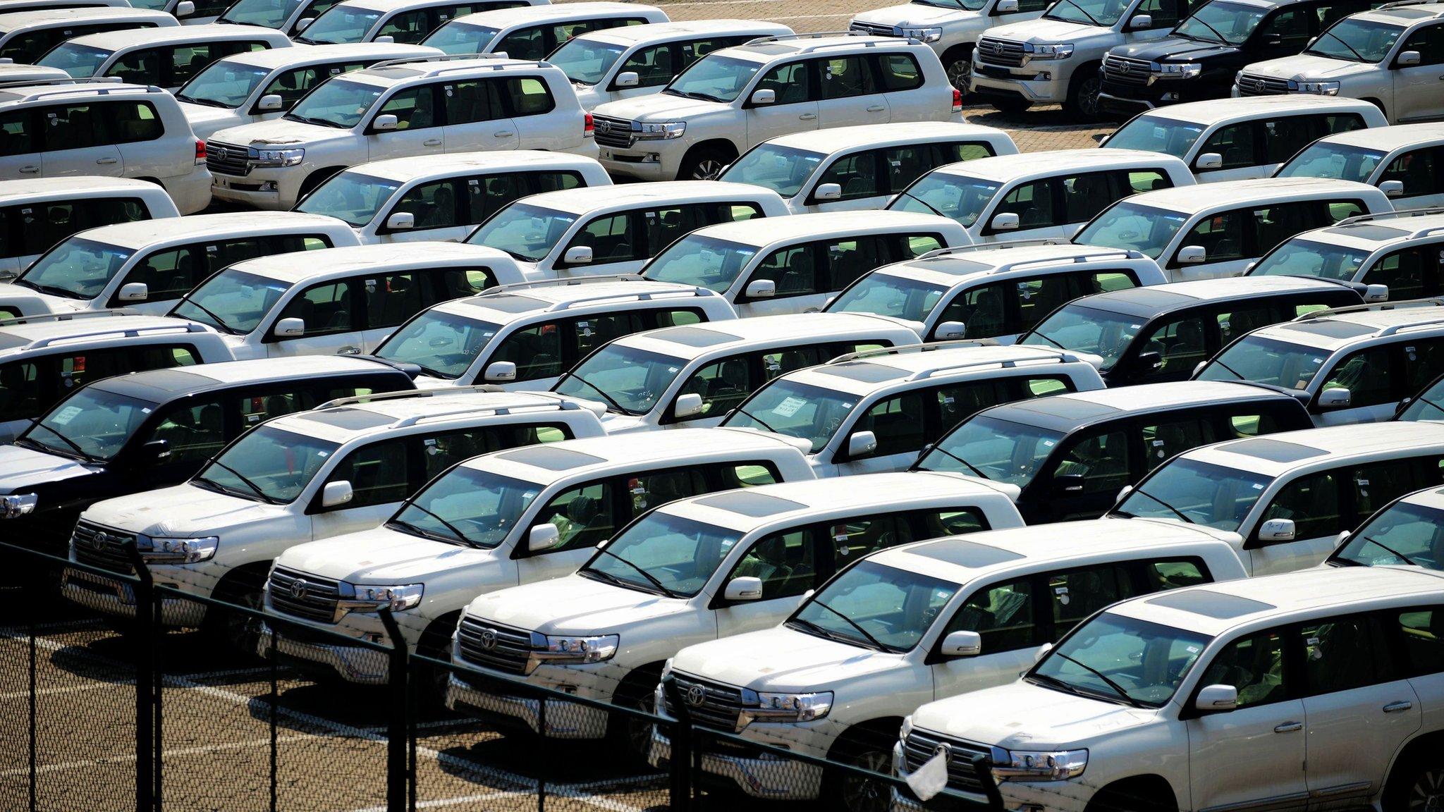 Imported cars are seen parked at a parking lot near a port in Qingdao, east China's Shandong province on April 17, 2017