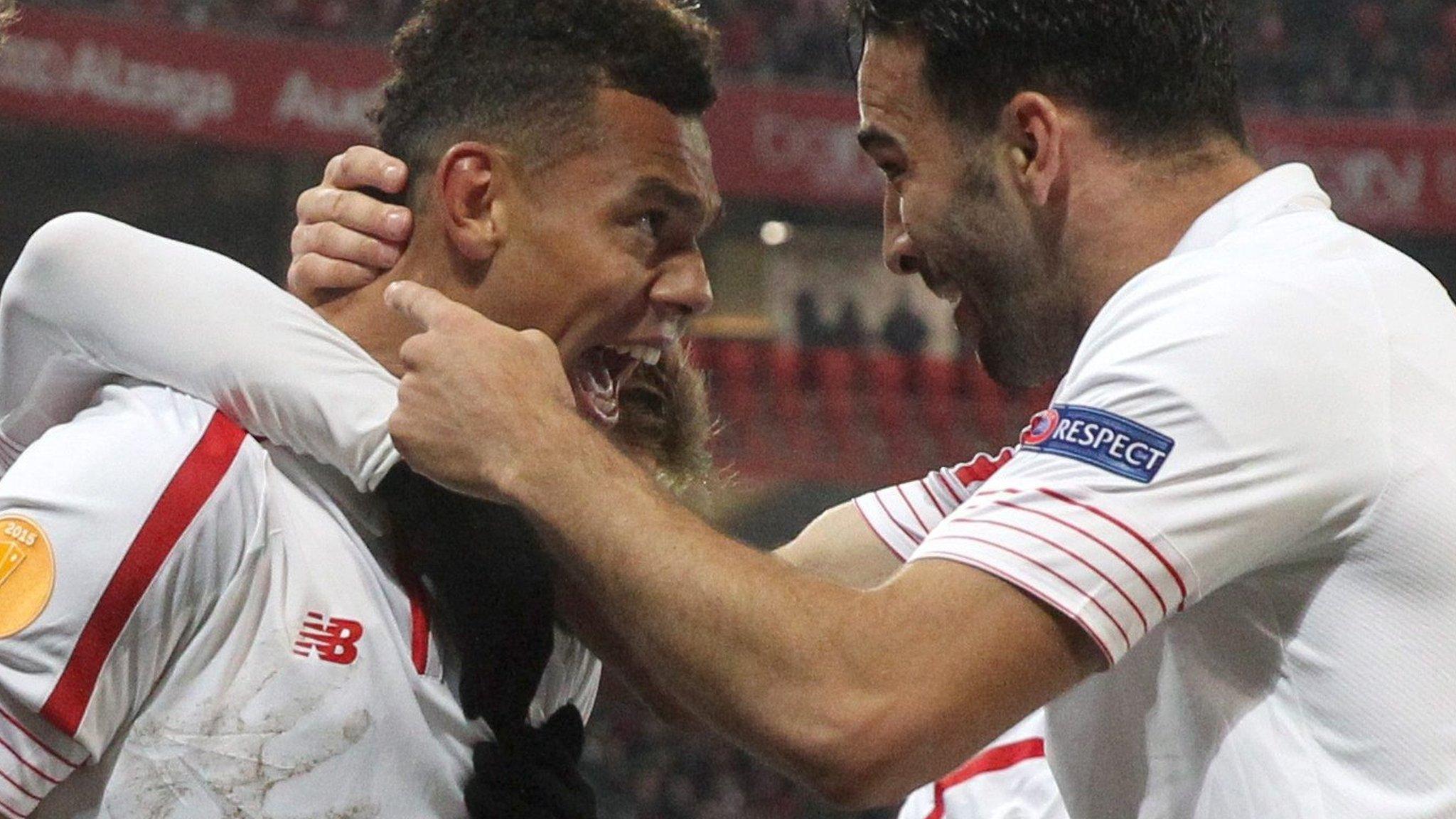 Timothee Kolodziejczak (left) celebrates with Sevilla team-mates