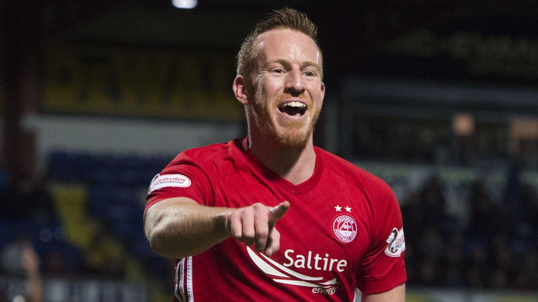 Adam Rooney celebrates scoring for Aberdeen