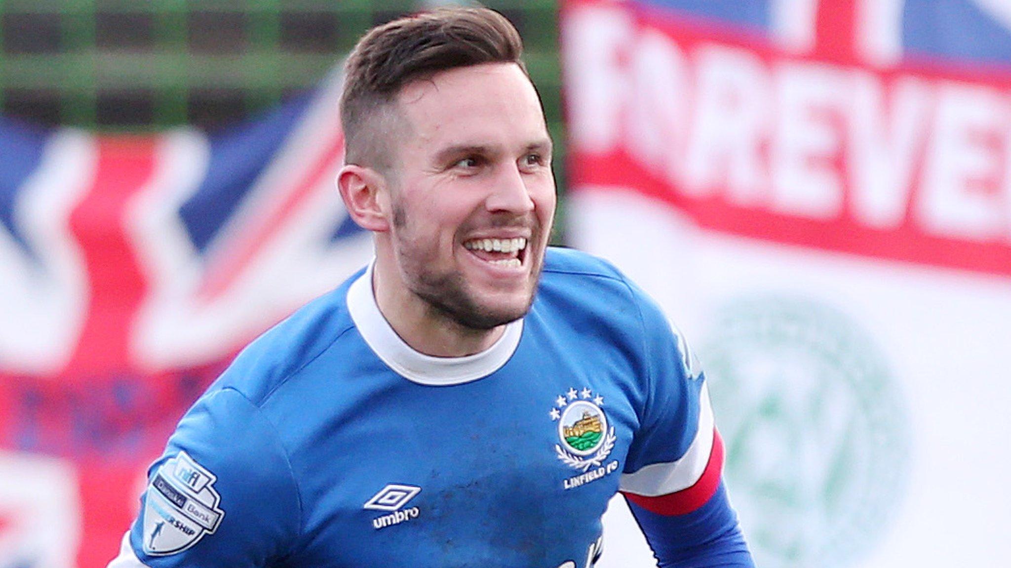 Linfield striker Andrew Waterworth celebrates scoring against Glentoran