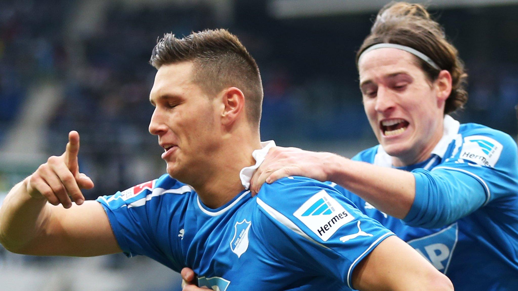 Niklas Sule (left) celebrates a Hoffenheim goal with Sebastian Rudy