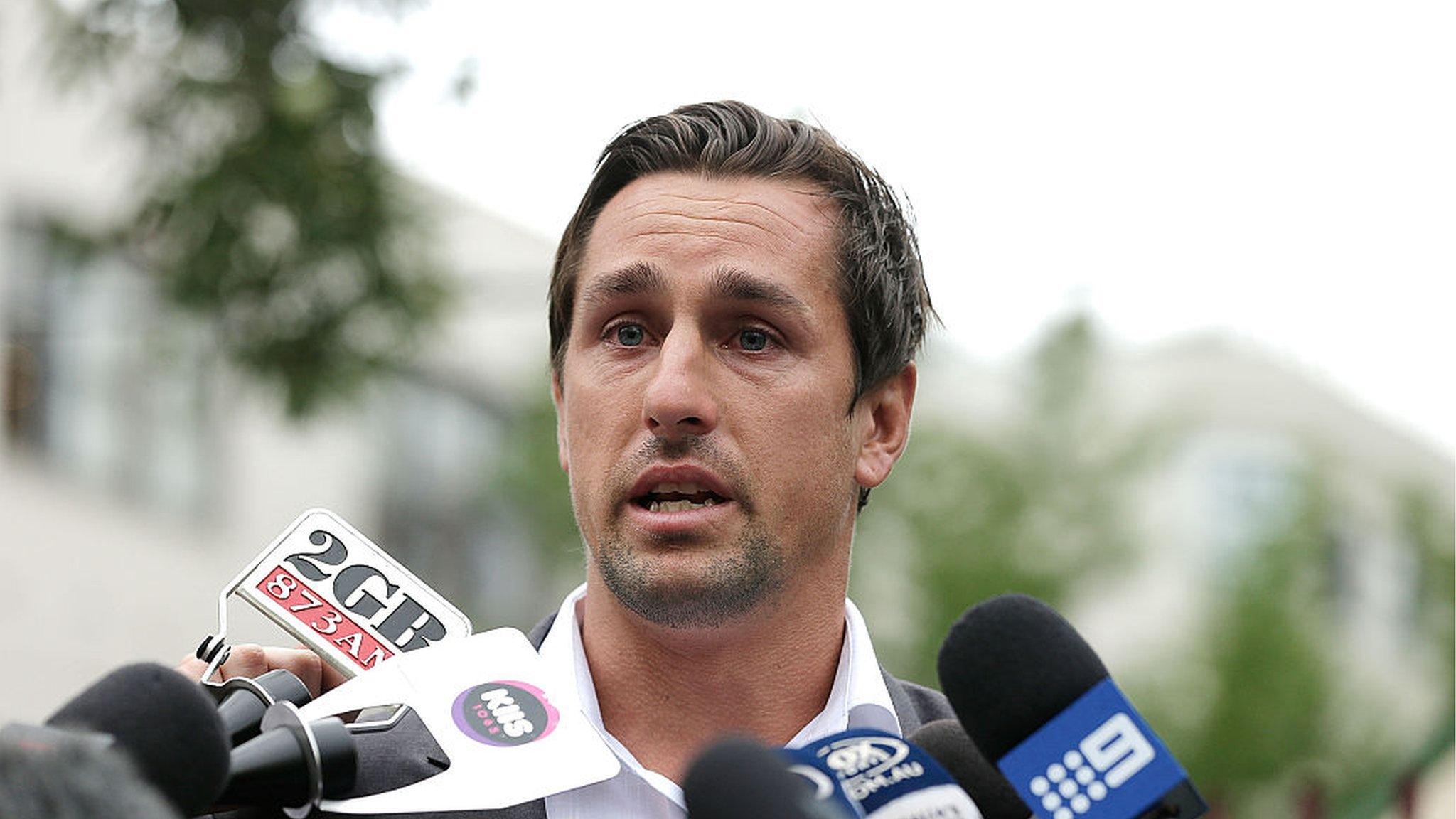 Mitchell Pearce speaks at a news conference