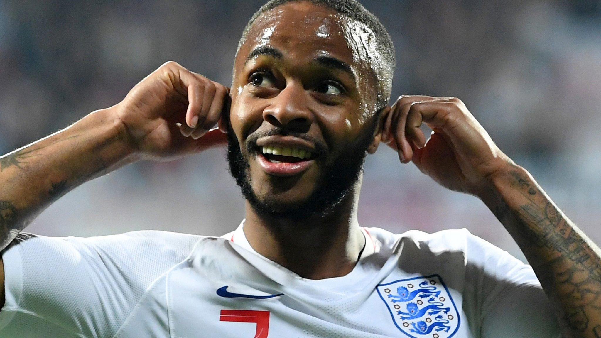 Raheem Sterling gestures to fans after scoring for England against Montenegro