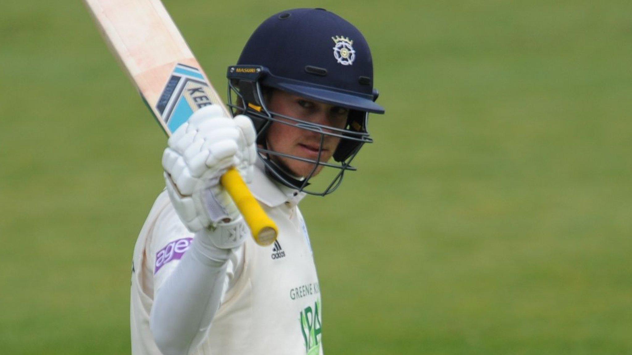 Hampshire batsman Sam Northeast celebrates reaching a milestone
