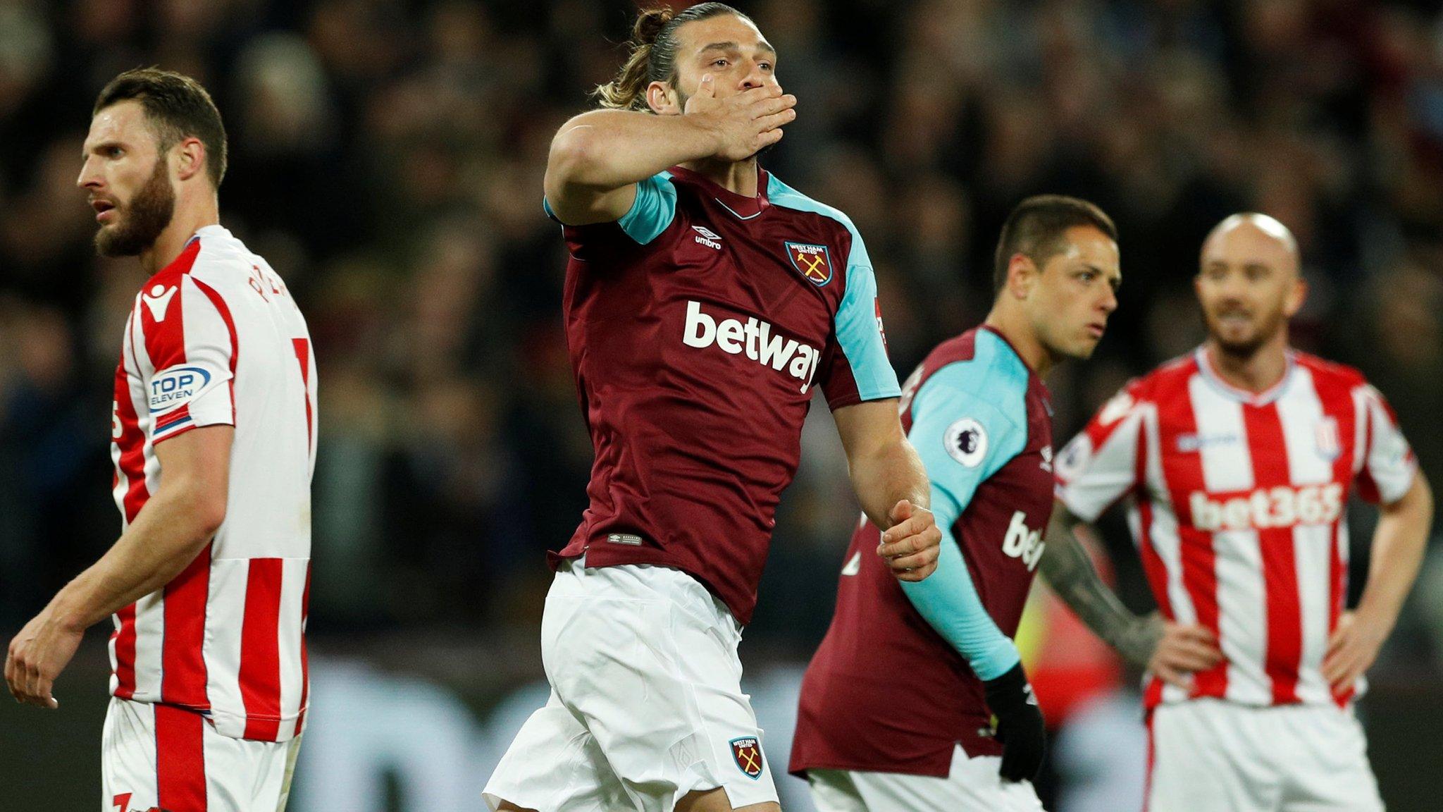 Andy Carroll celebrates scoring West Ham's equaliser against Stoke