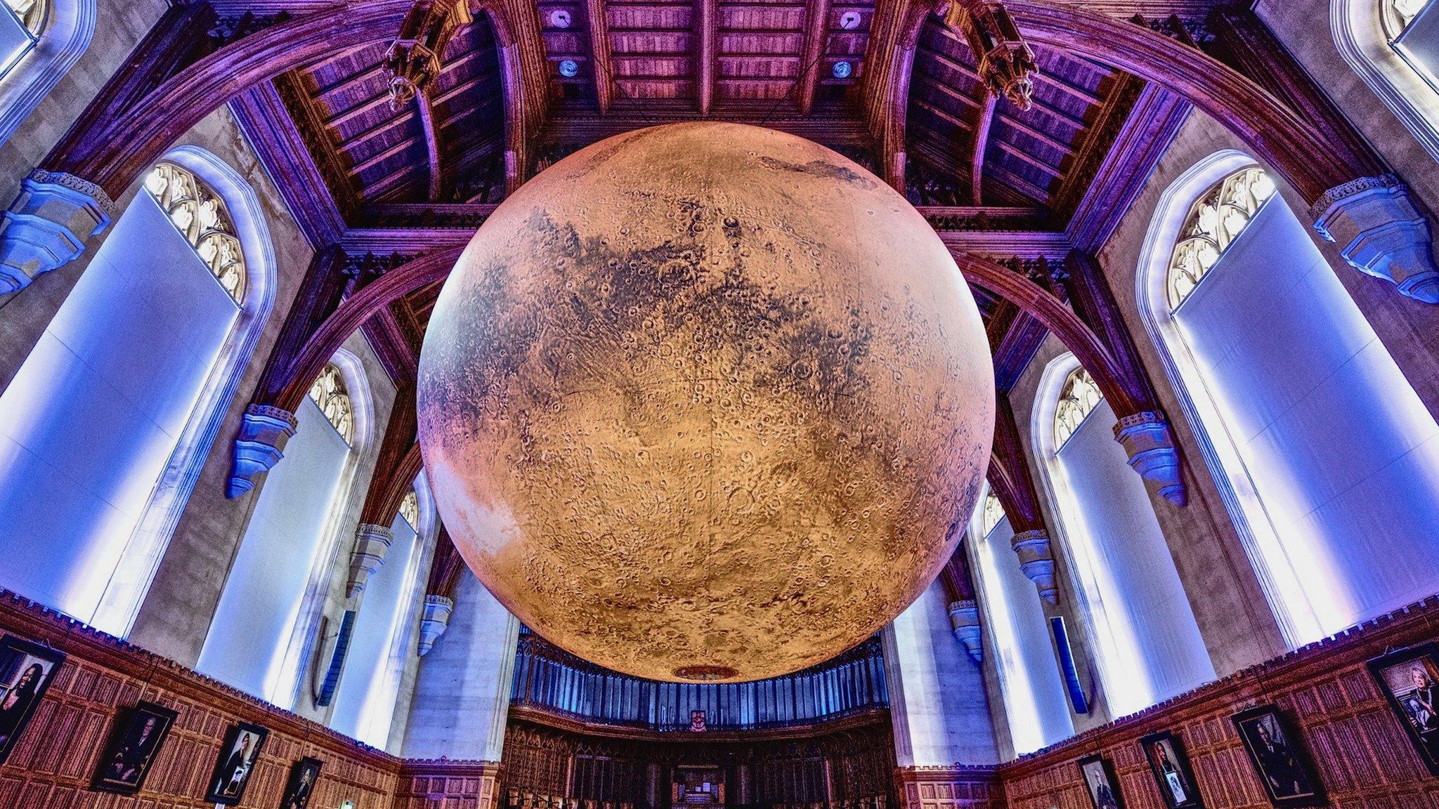 Mars amid church cloisters