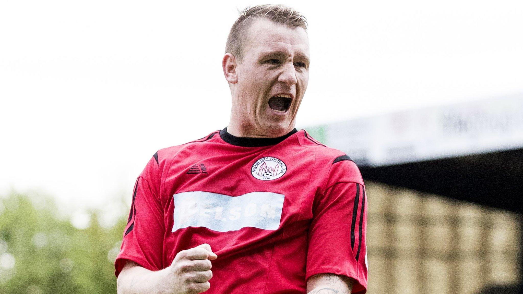 Brechin City's Andy Jackson celebrates scoring the winning penalty