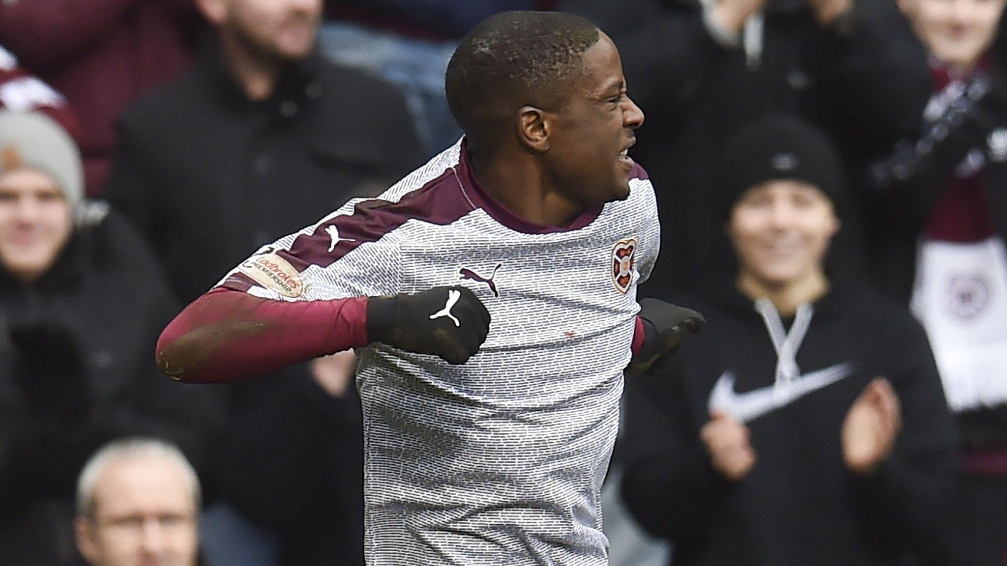 Hearts midfielder Arnaud Djoum