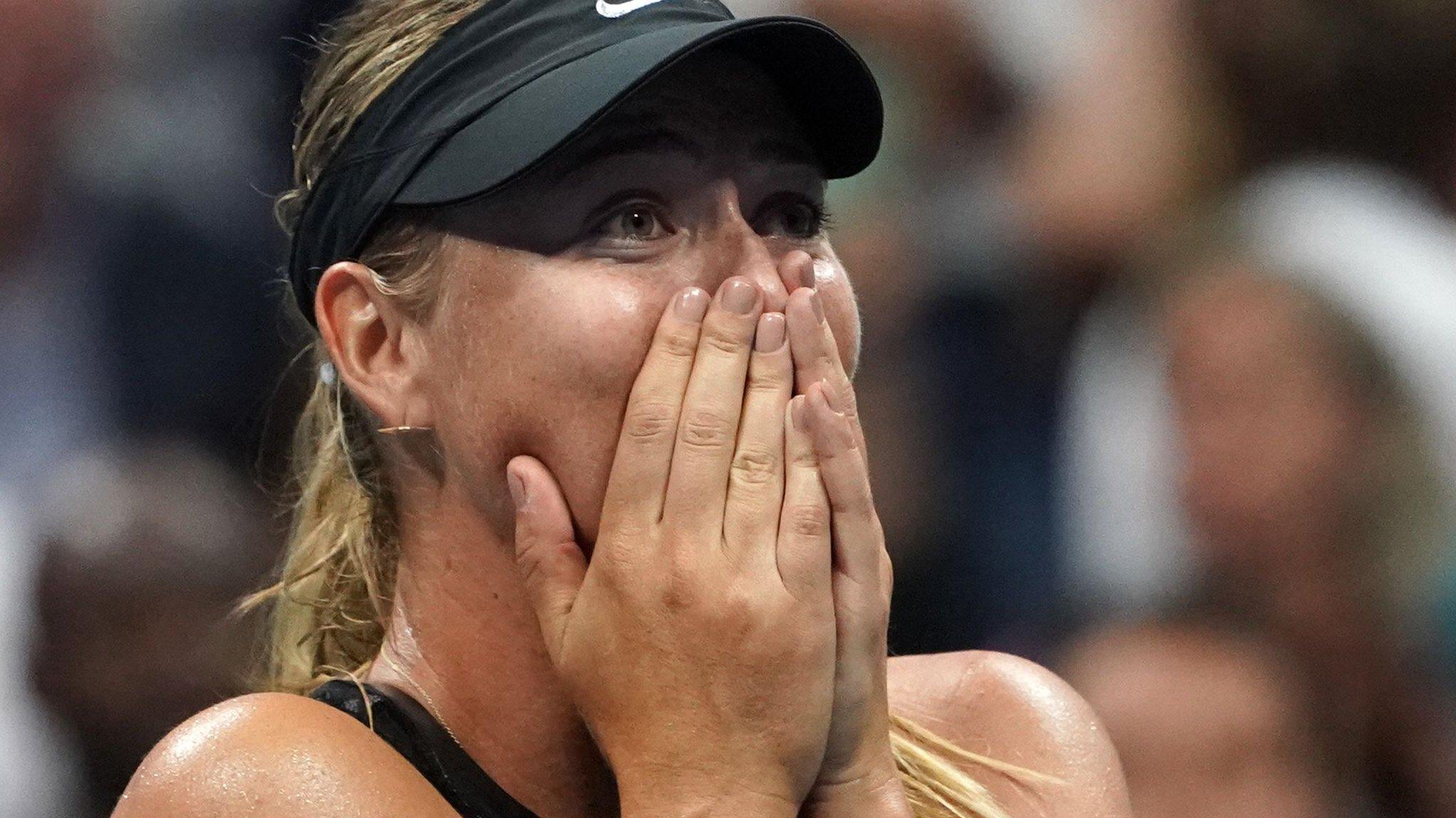 Maria Sharapova celebrates beating Simona Halep at the US Open