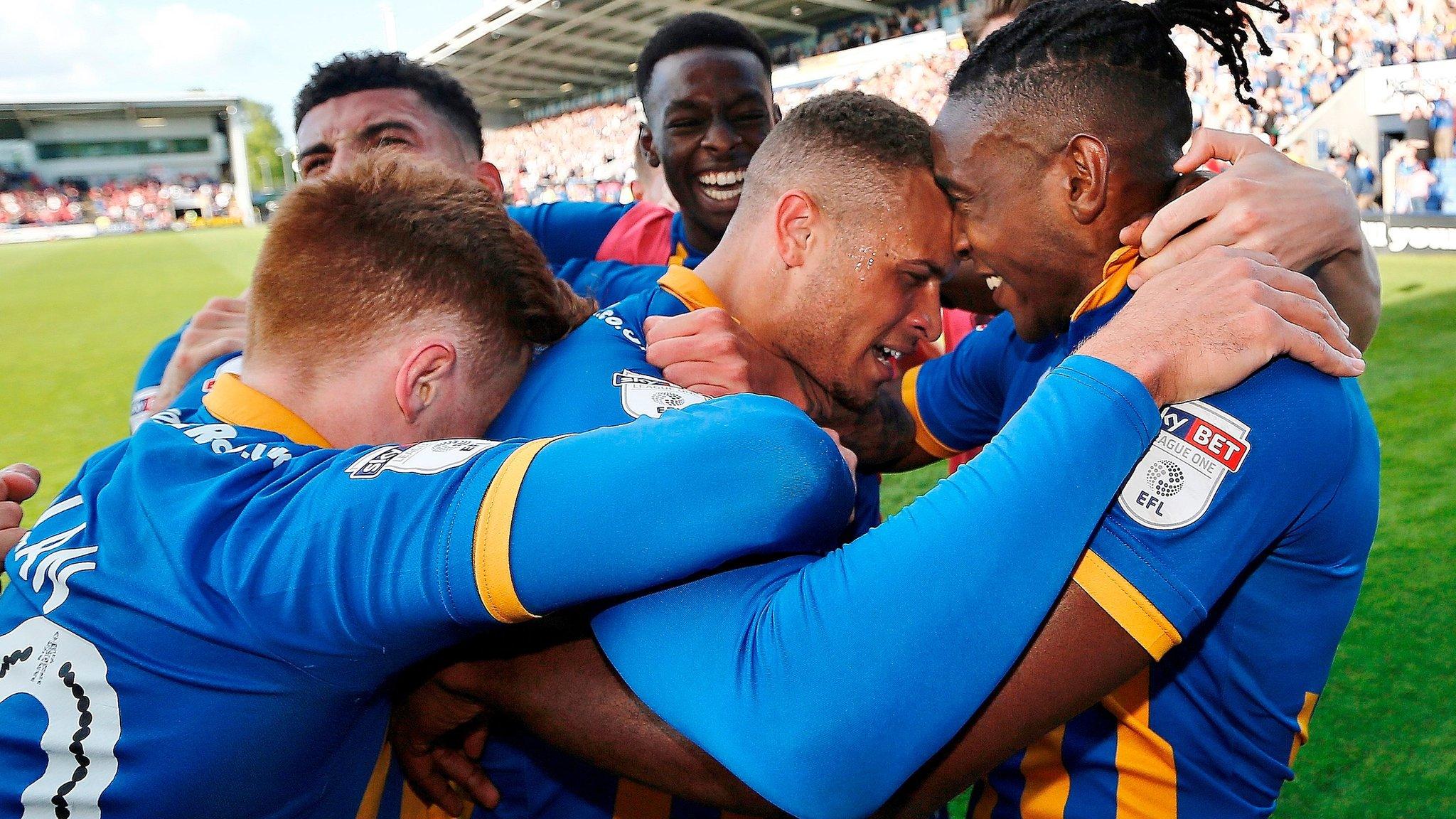 Shrewsbury celebrate Carlton Morris' goal