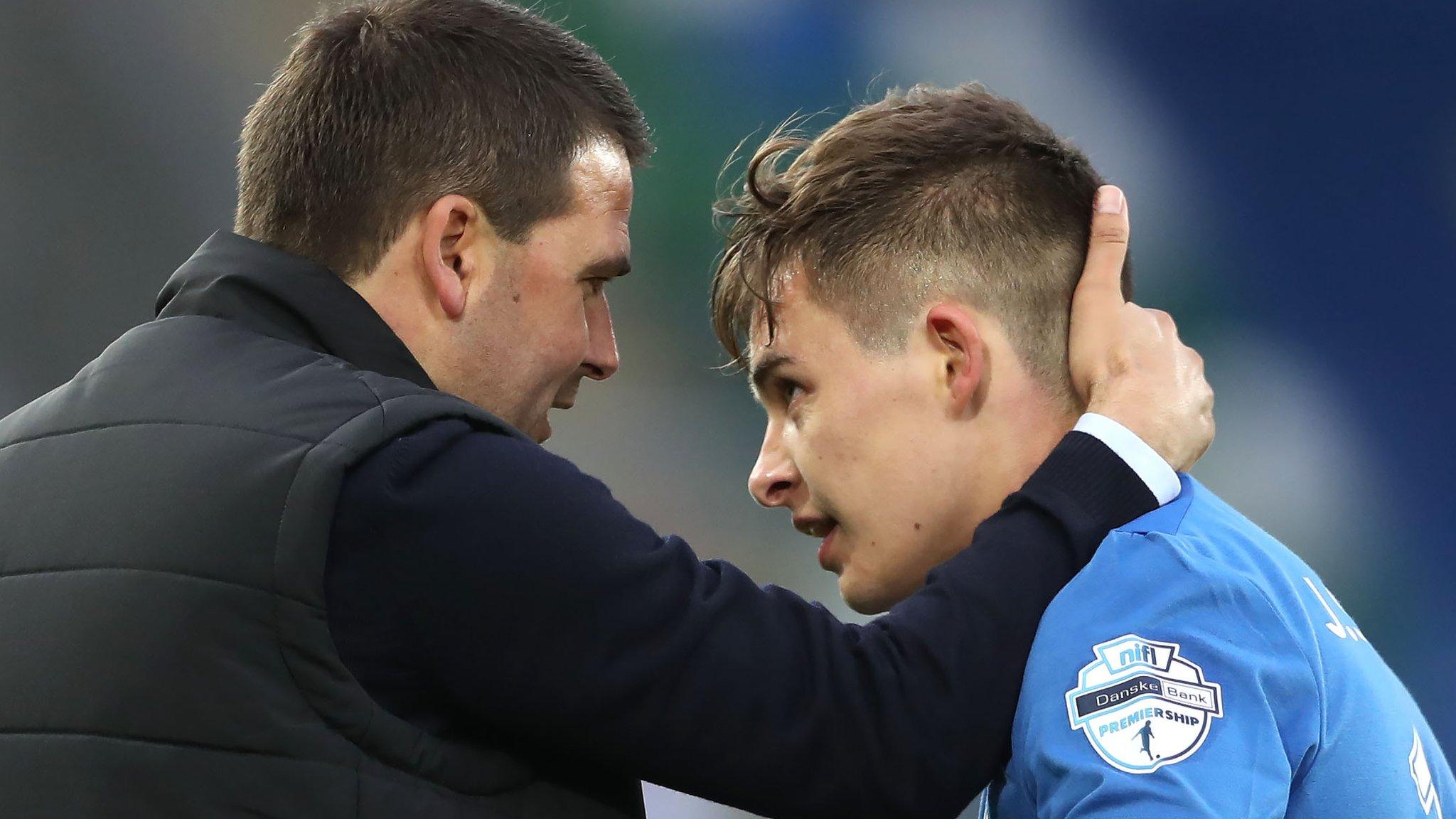 David Healy congratulates Jordan Stewart on his winning goal