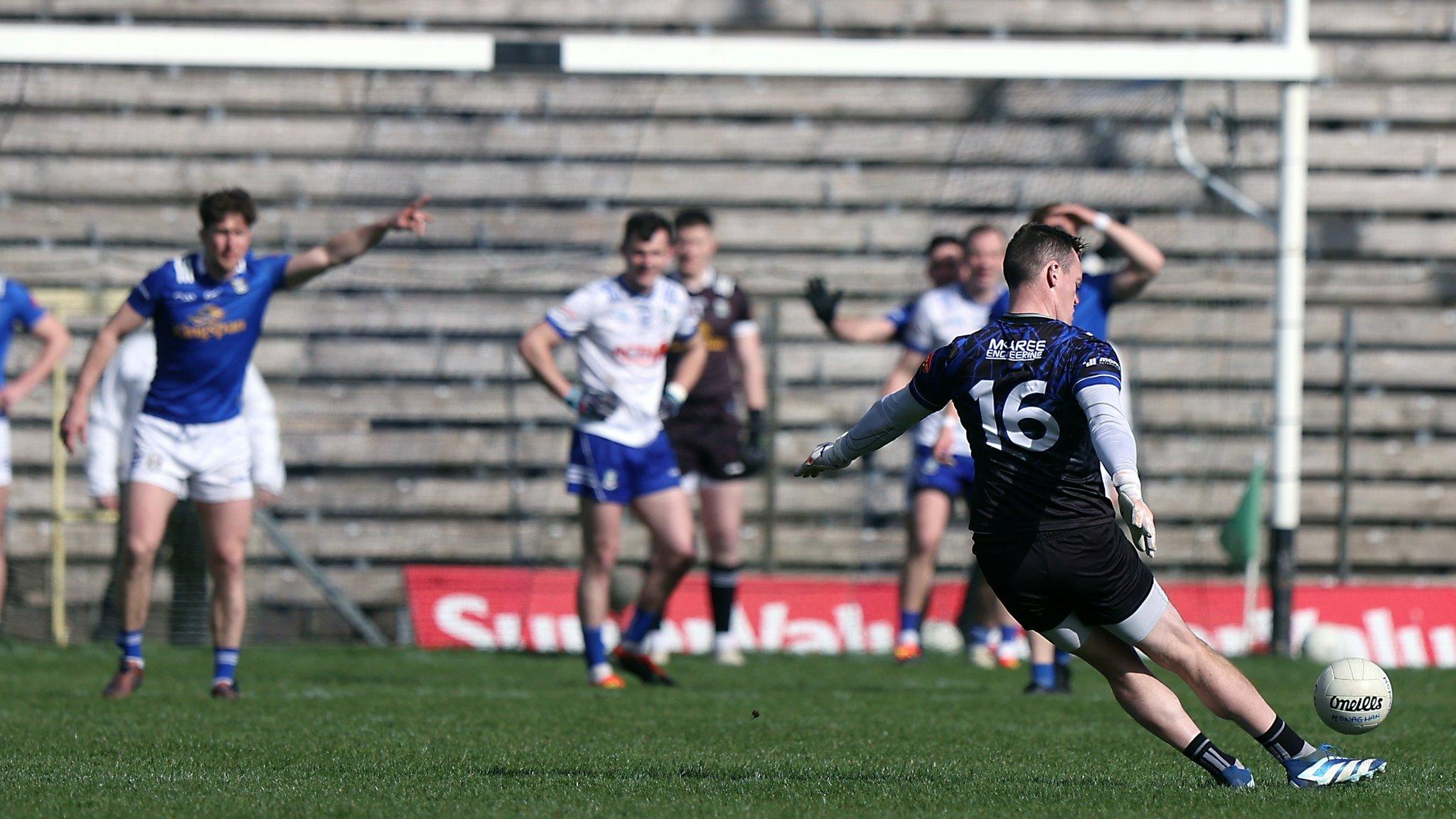 Rory Beggan kicks a point for Monaghan