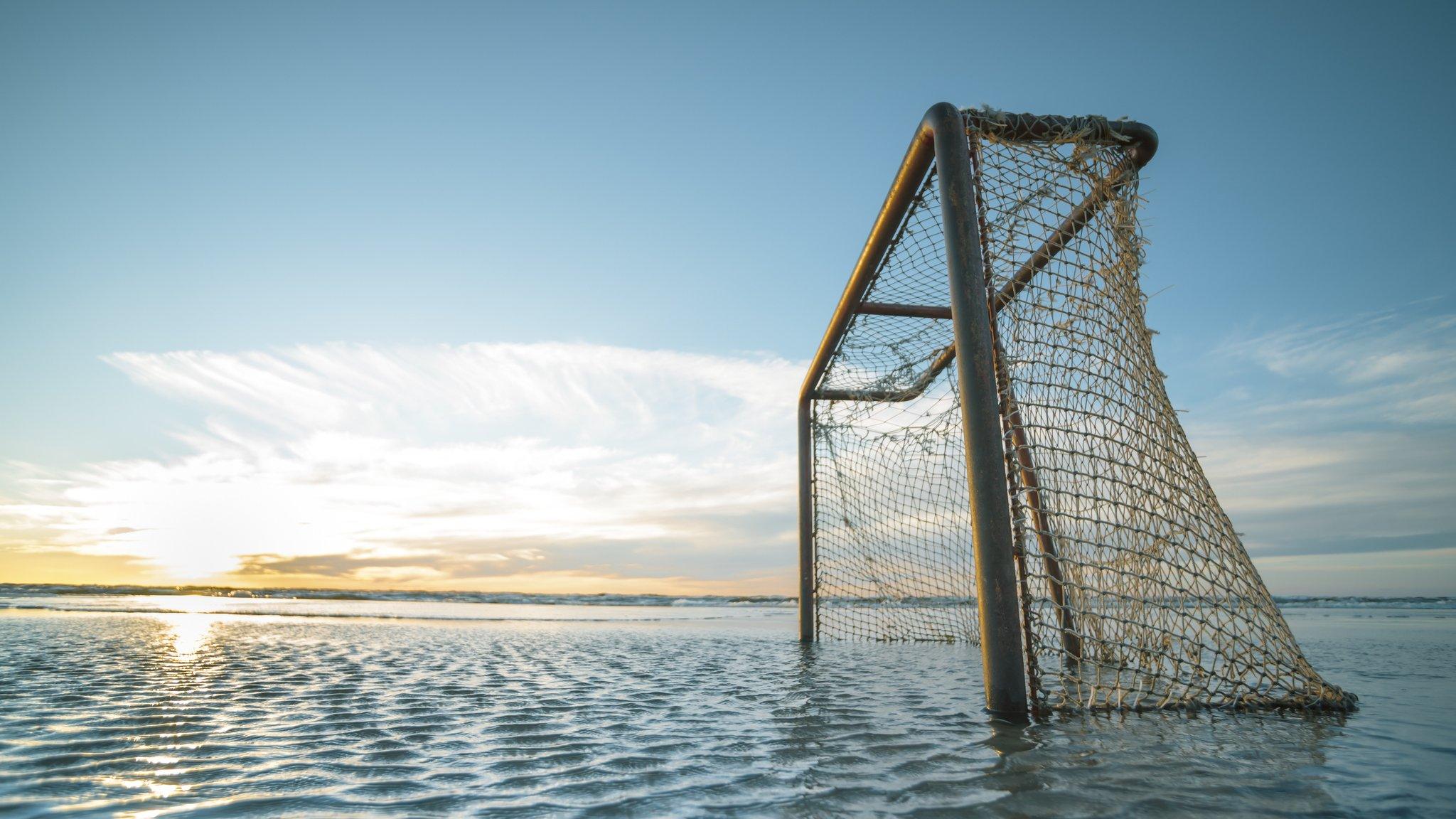 Football goal in water