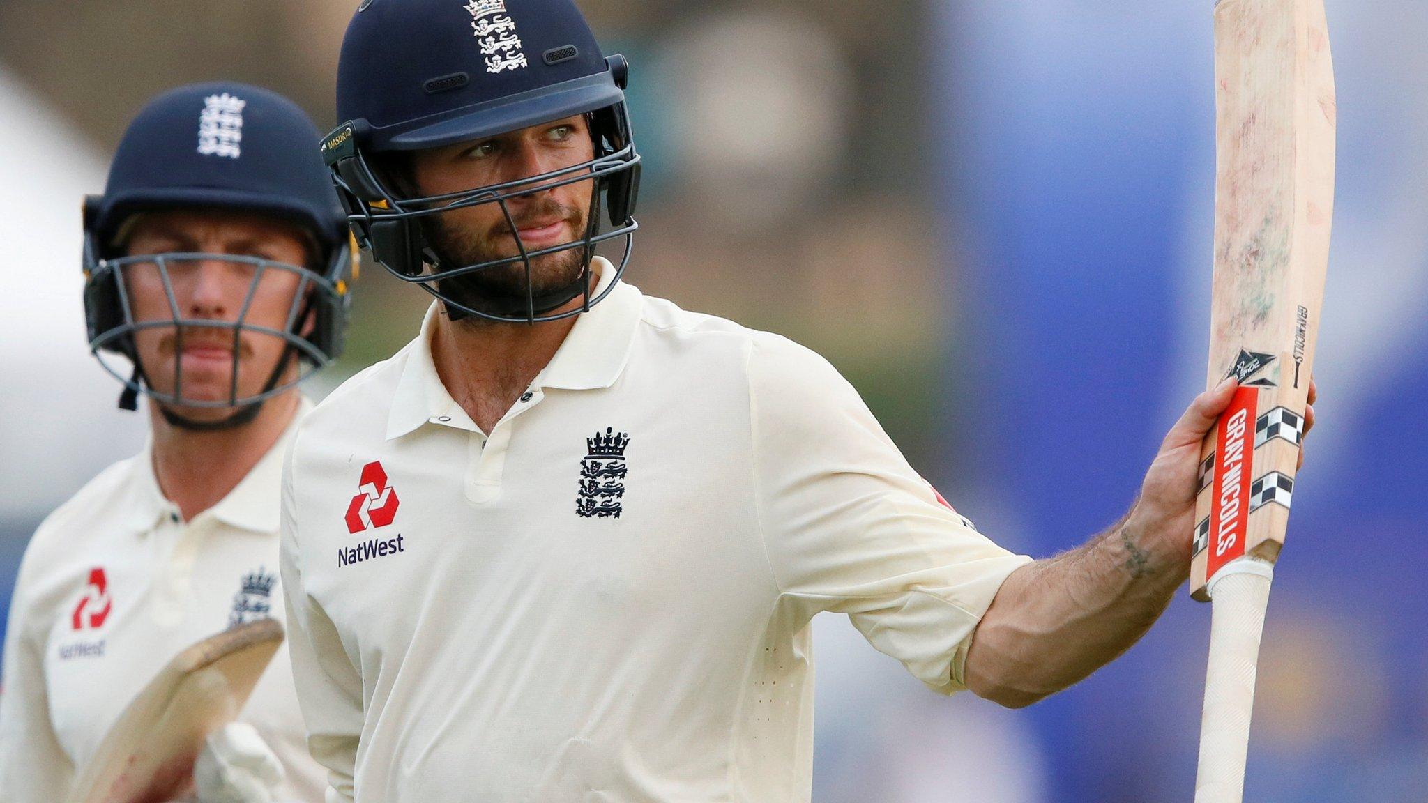 Ben Foakes raises his bat to the crowd at the end of day one of the first Test between Sri Lanka and England