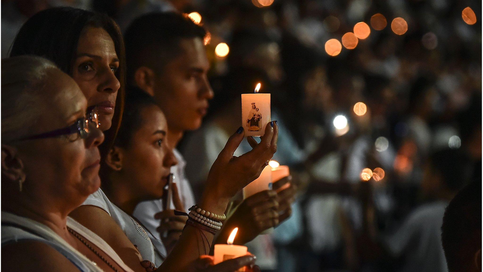 People participate in a tribute to the players of Brazilian team Chapecoense Real killed in a plane crash in the Colombian mountains, on 29 November 2016 in Medellin, Colombia