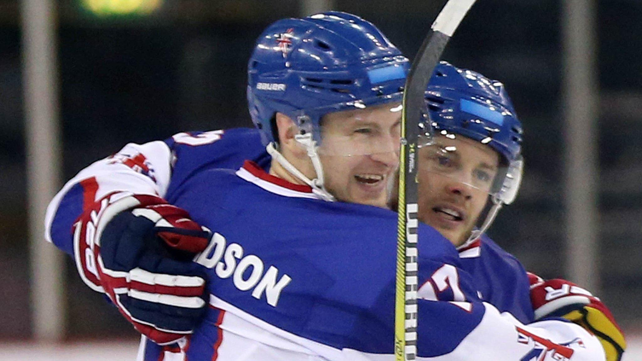 Robert Dowd (left) is congratulated by Mark Richardson after scoring Great Britain's opening goal