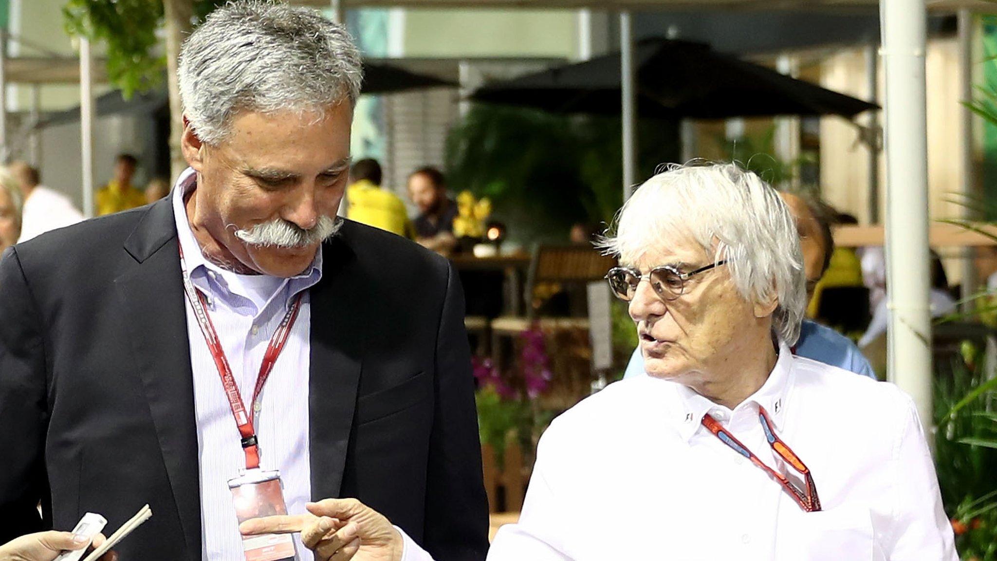 Chase Carey and Bernie Ecclestone