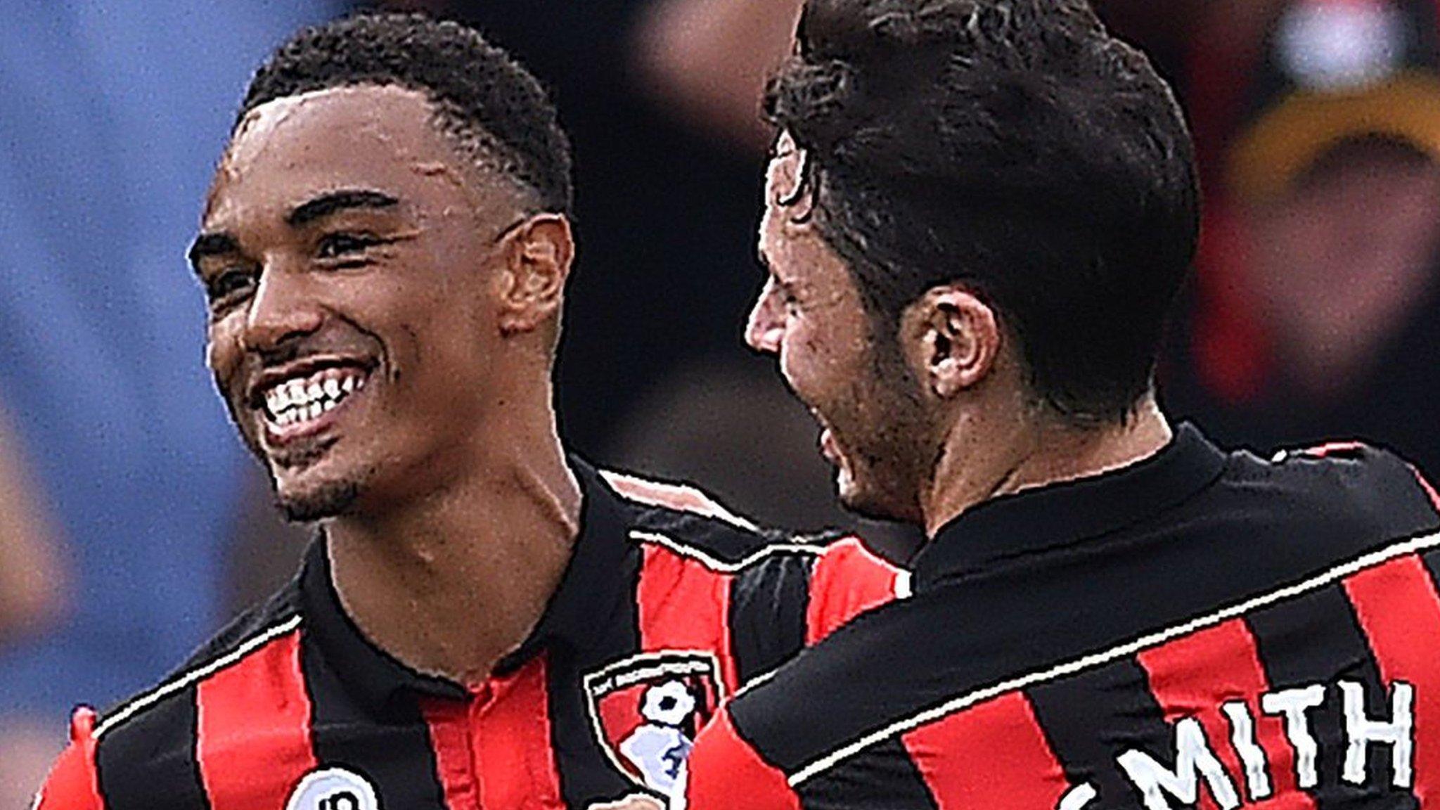 Bournemouth players celebrate the first goal against Everton