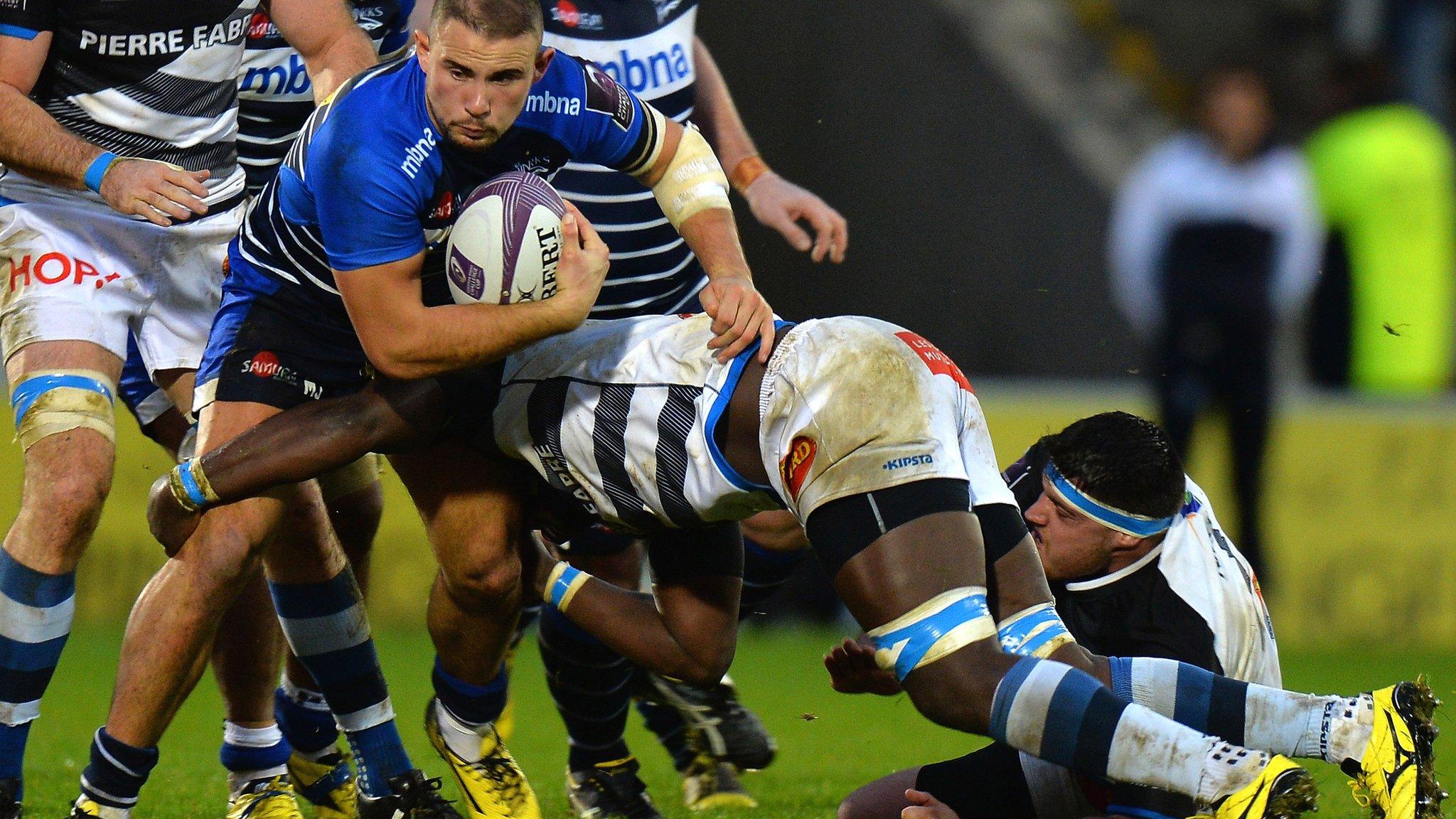 Sales' Mark Jennings getting wrapped up in a tackle agaisnt Castres