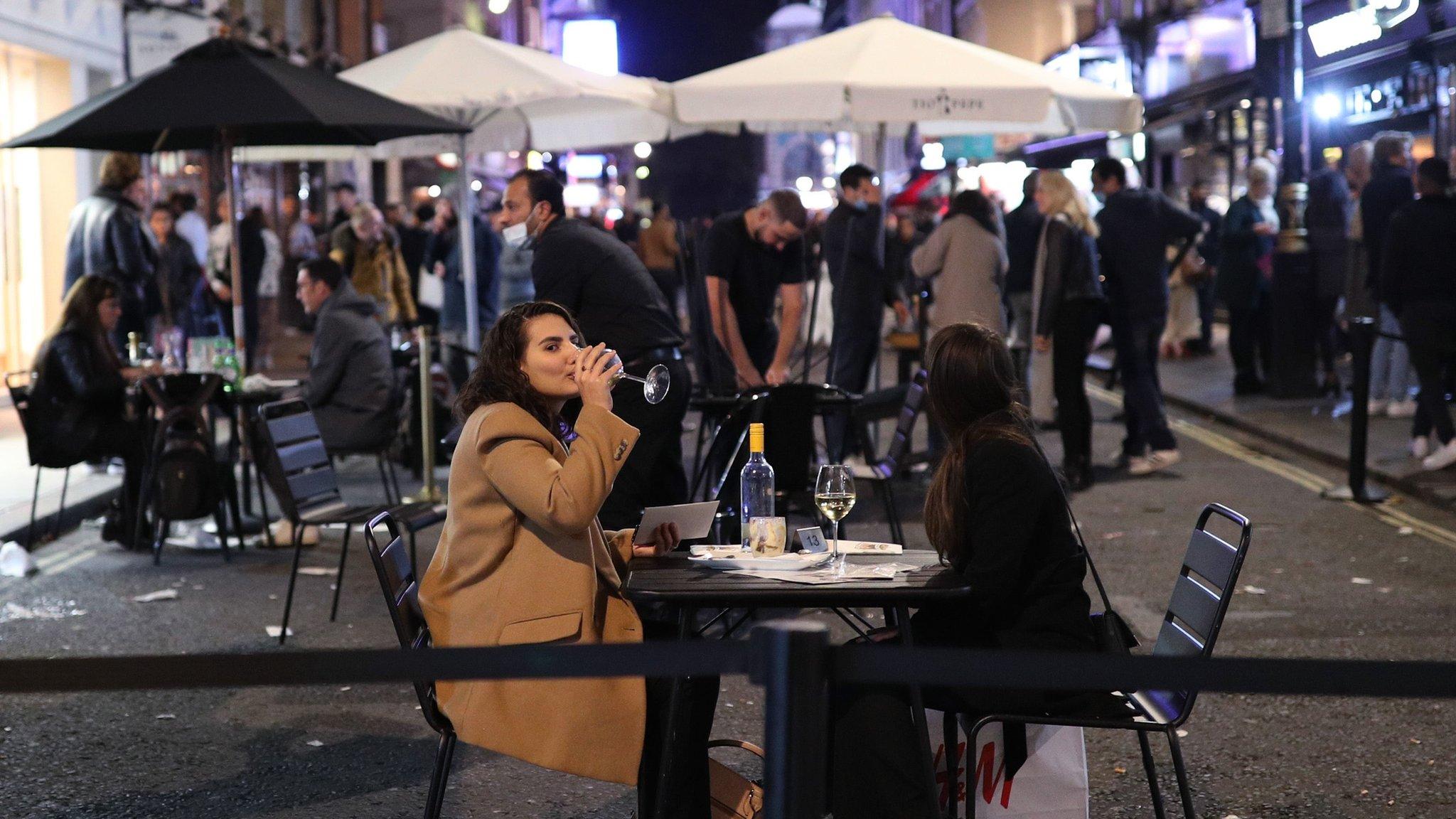 People drinking in Soho, central London