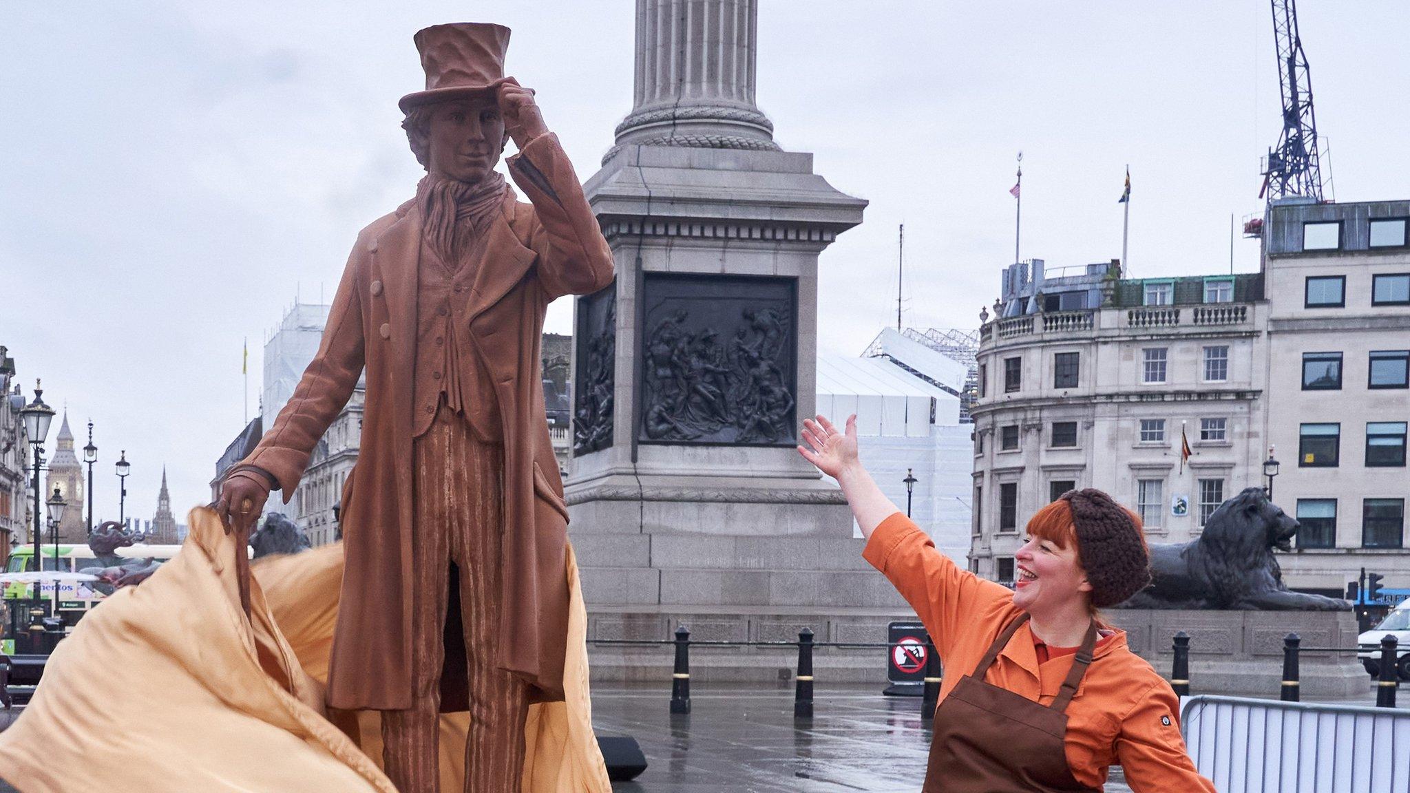 Jen Lindsey-Clark next to her chocolate statue