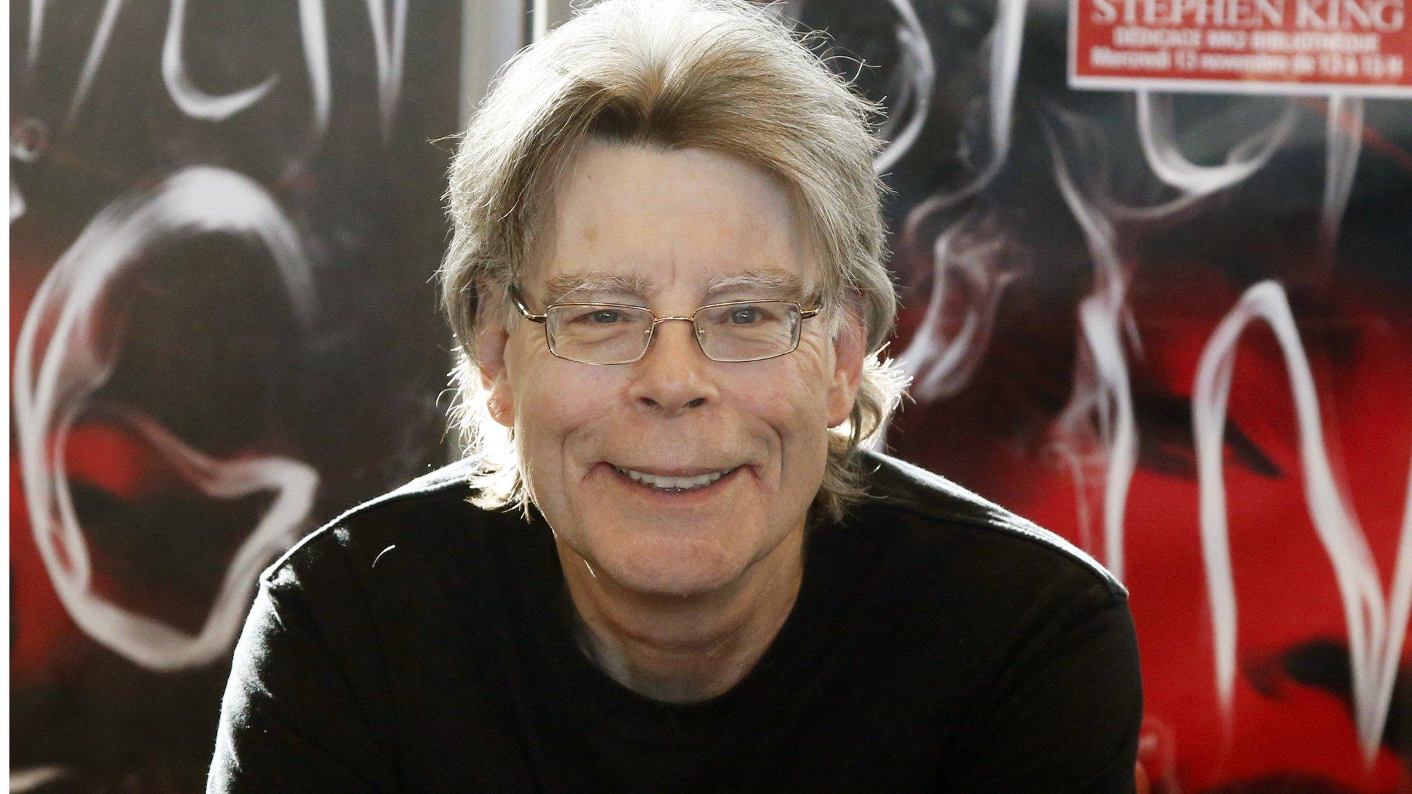 Stephen King posing for cameras during a promotional book tour in Paris on 13 November 2013.